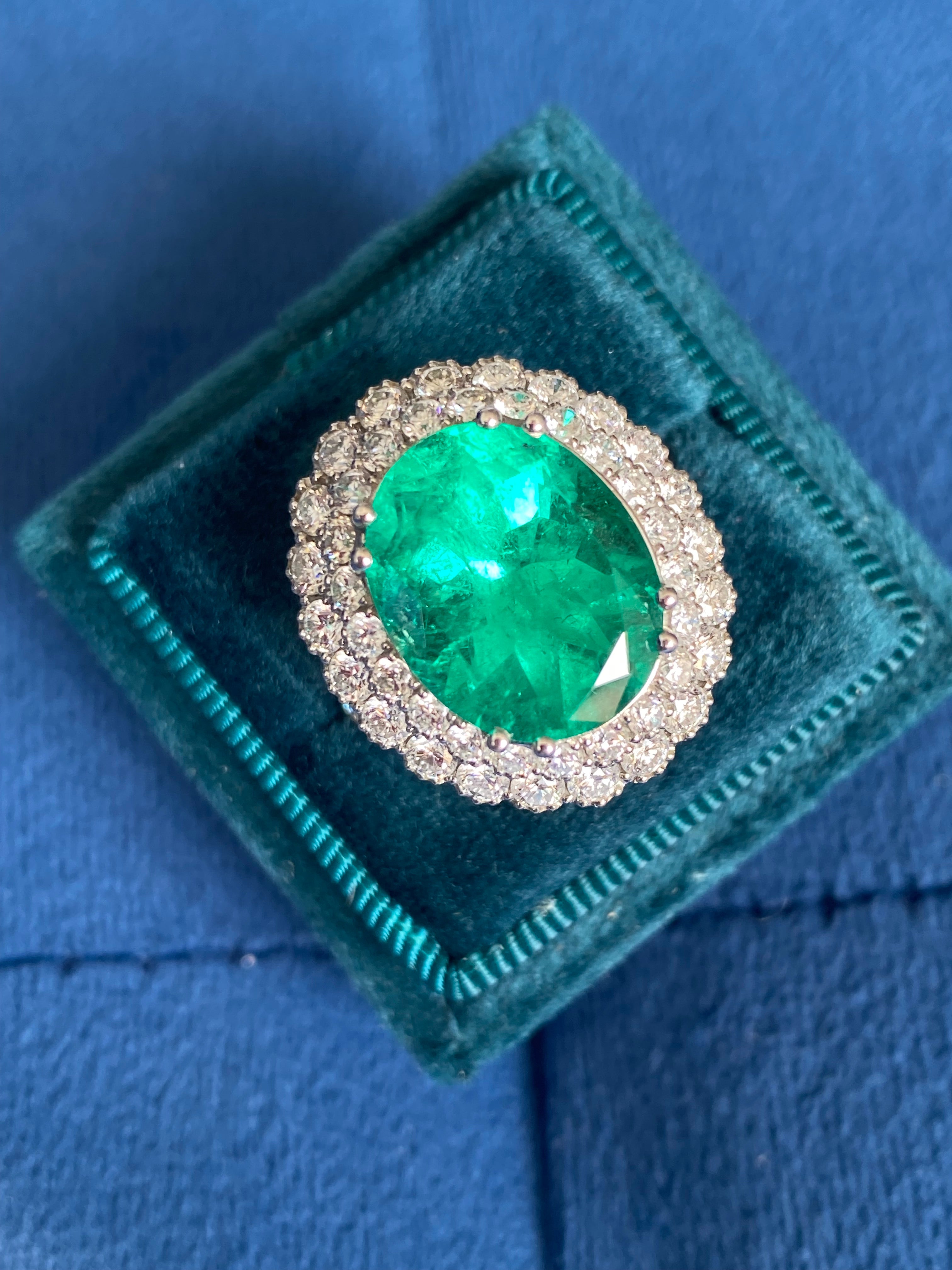 9.10 CTW Colombian Emerald and Natural Diamond Double Halo Ring in Platinum