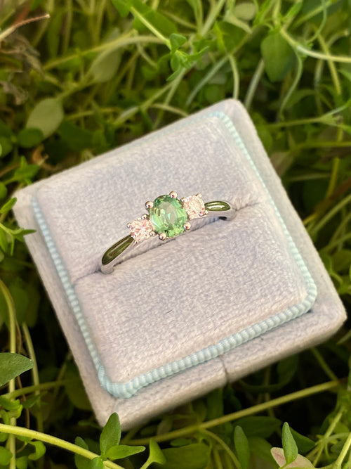 0.40 Carat Tsavorite Garnet and 0.20 Carat Diamond Three Stone Engagement Ring in Platinum