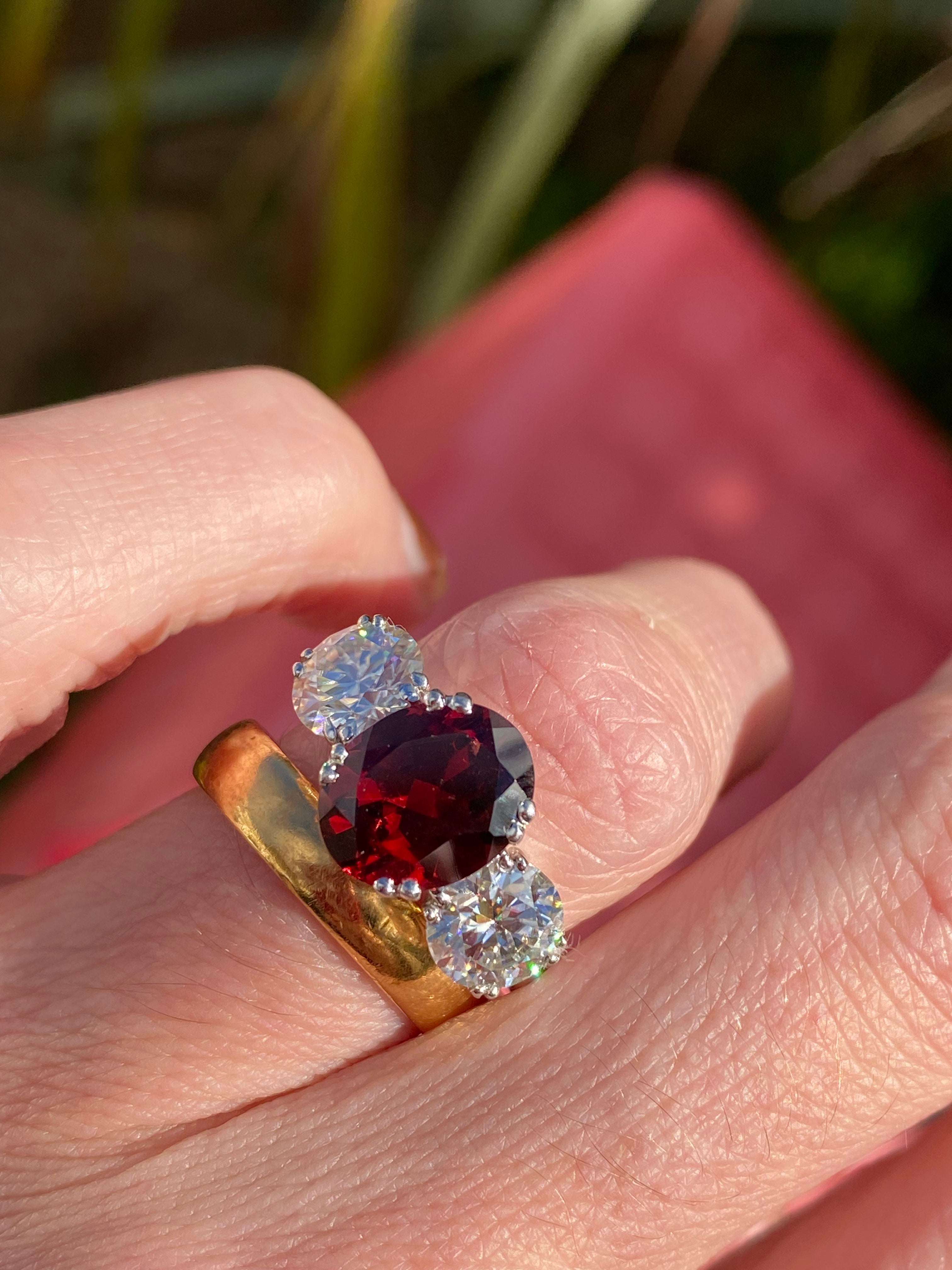 2.57 Carat Garnet and 1.84 Carat Moissanite Three Stone Ring in Sterling Silver