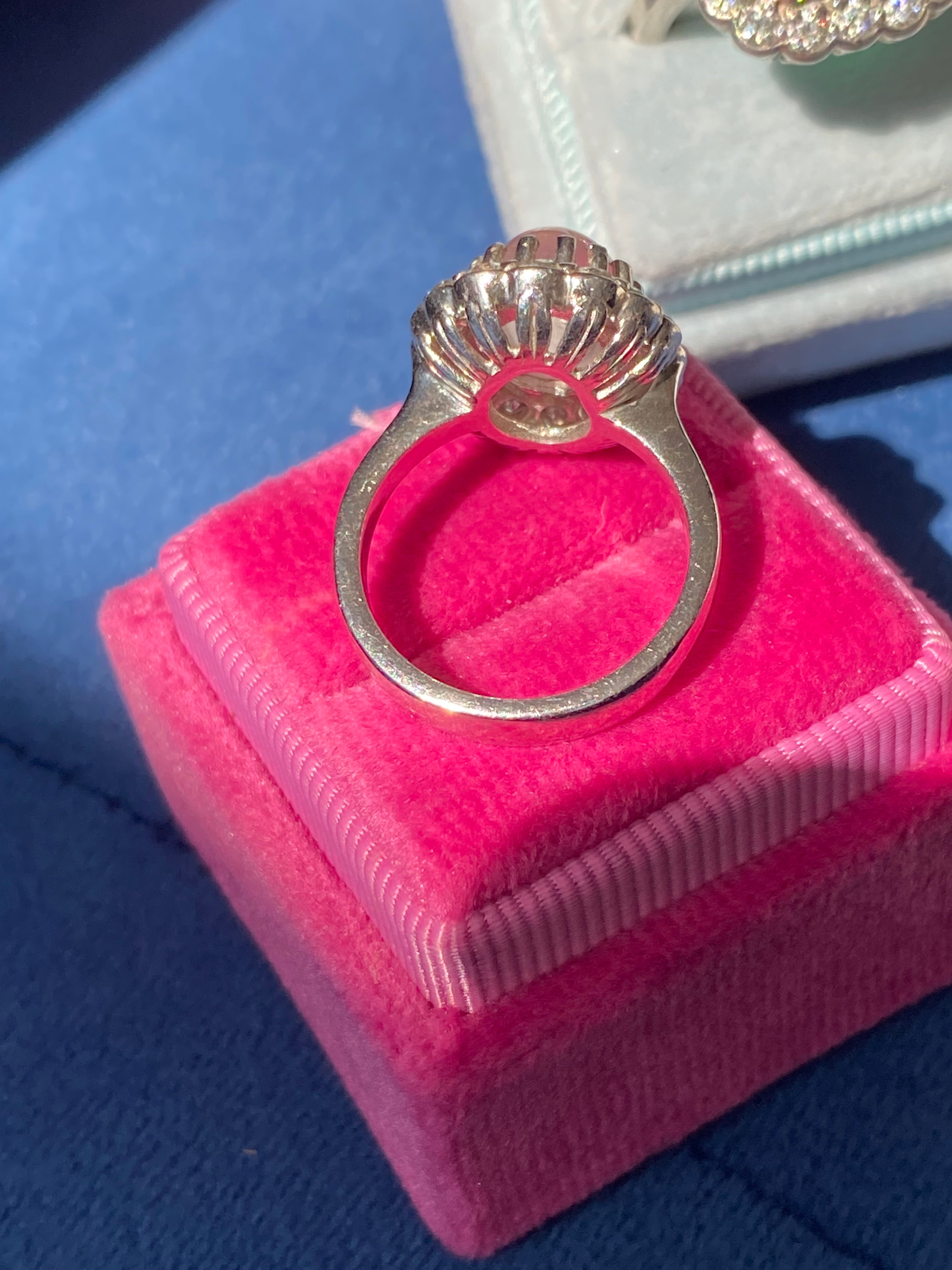 4.50 CTW Oval Cabochon Cut Rose Quartz and Moissanite Halo Cocktail Ring in Sterling Silver