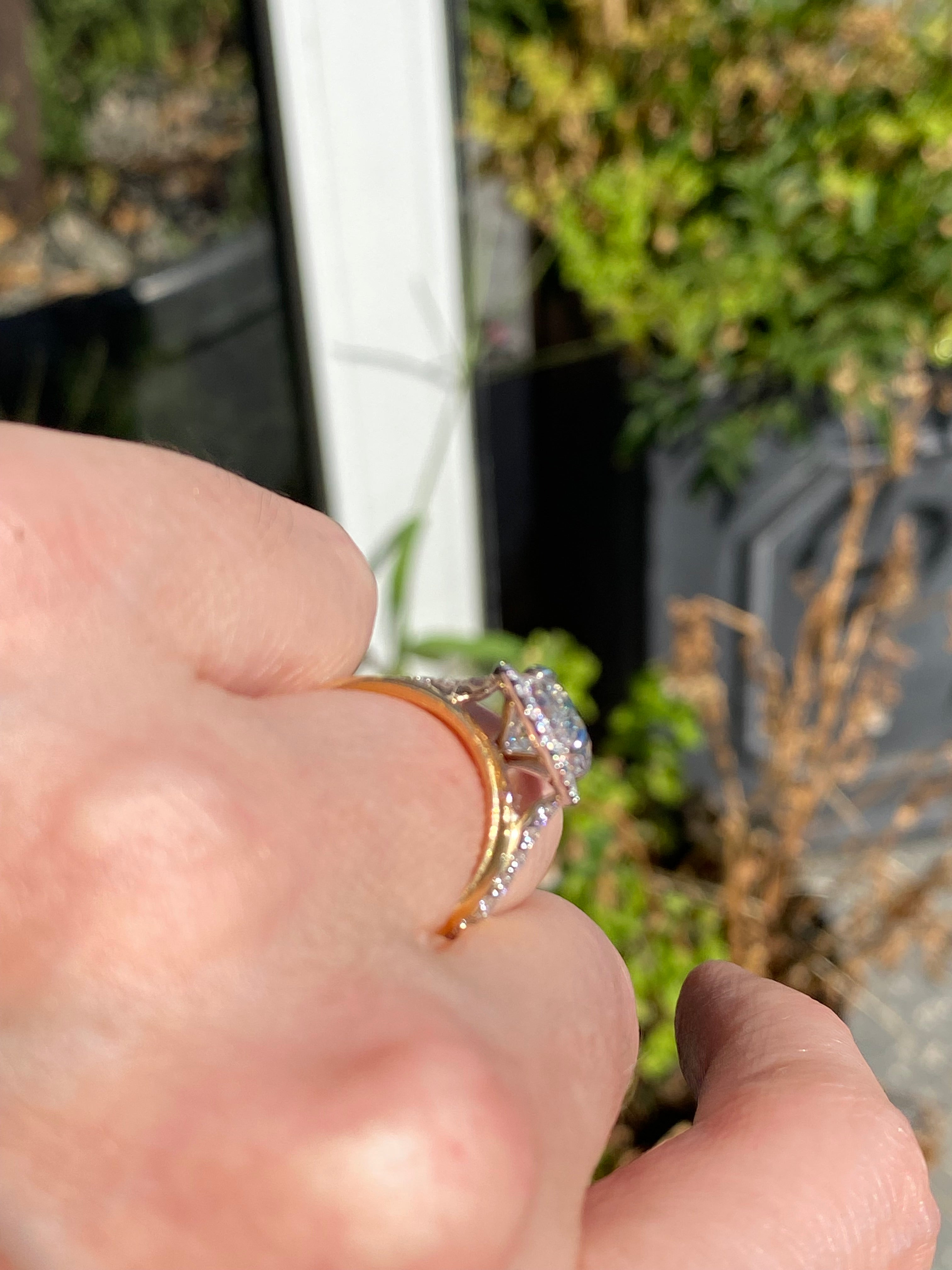 3.58 CTW Oval Cut Lab Diamond Halo Engagement Ring in Platinum