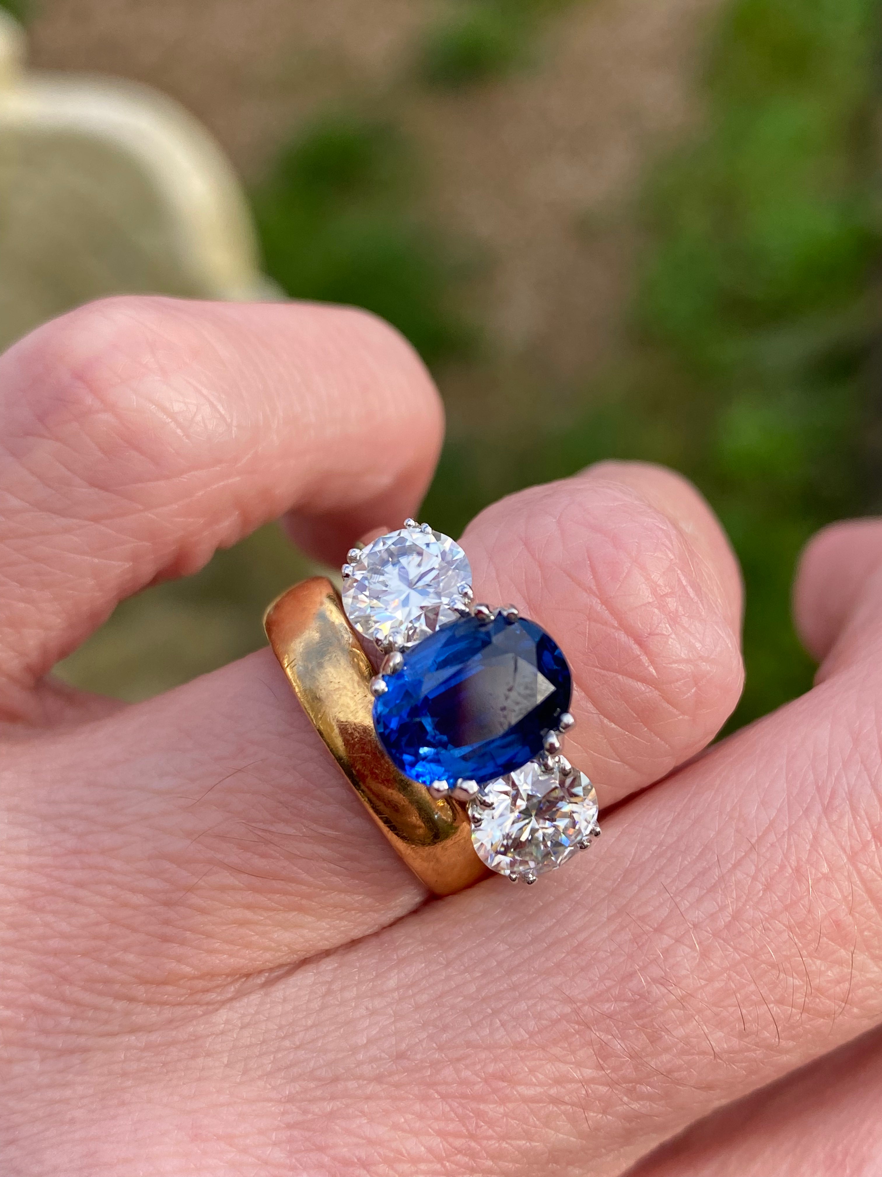 4.41 CTW Oval Cut Kyanite and Moissanite Three Stone Ring in Sterling Silver