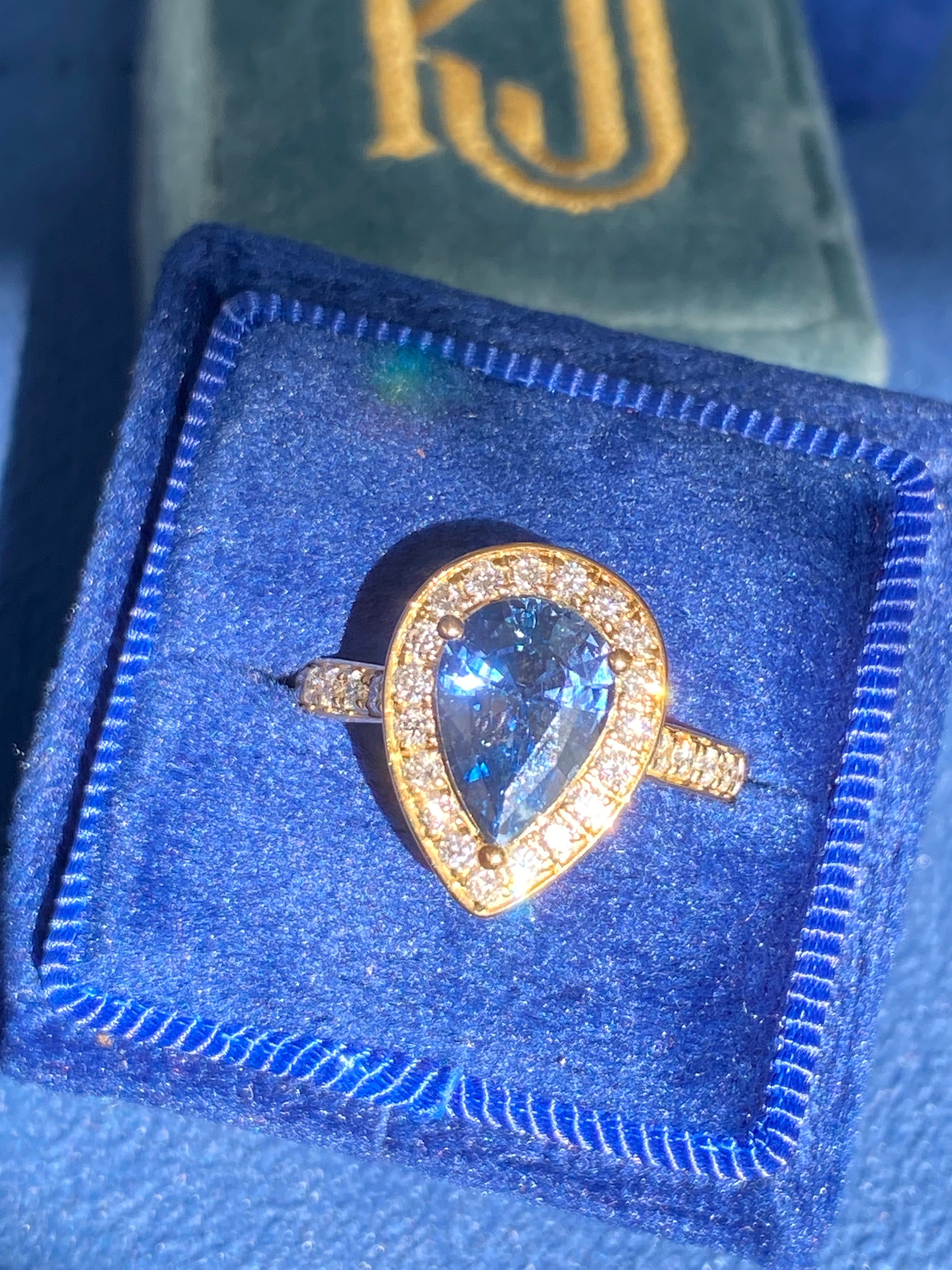 2.07 Carat Pear Cut Teal Sapphire and 0.48 CTW Natural Diamond Ring in 18ct Yellow Gold