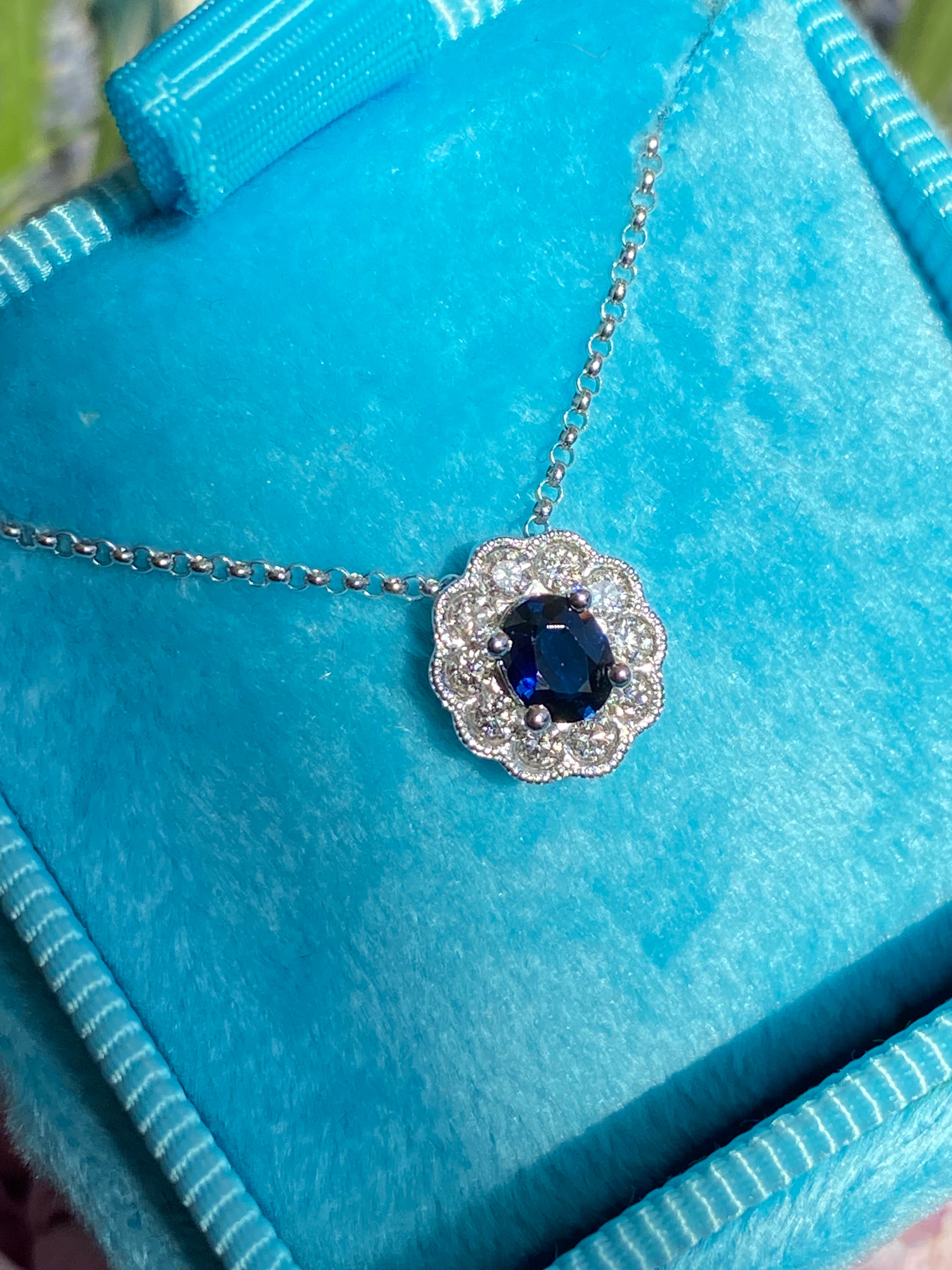 0.73 CTW Sapphire and Natural Diamond Pendant Necklace in 18ct White Gold