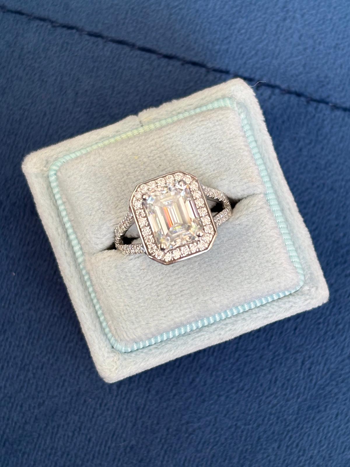 3.10 CTW Emerald Cut Moissanite Halo Ring in Sterling Silver