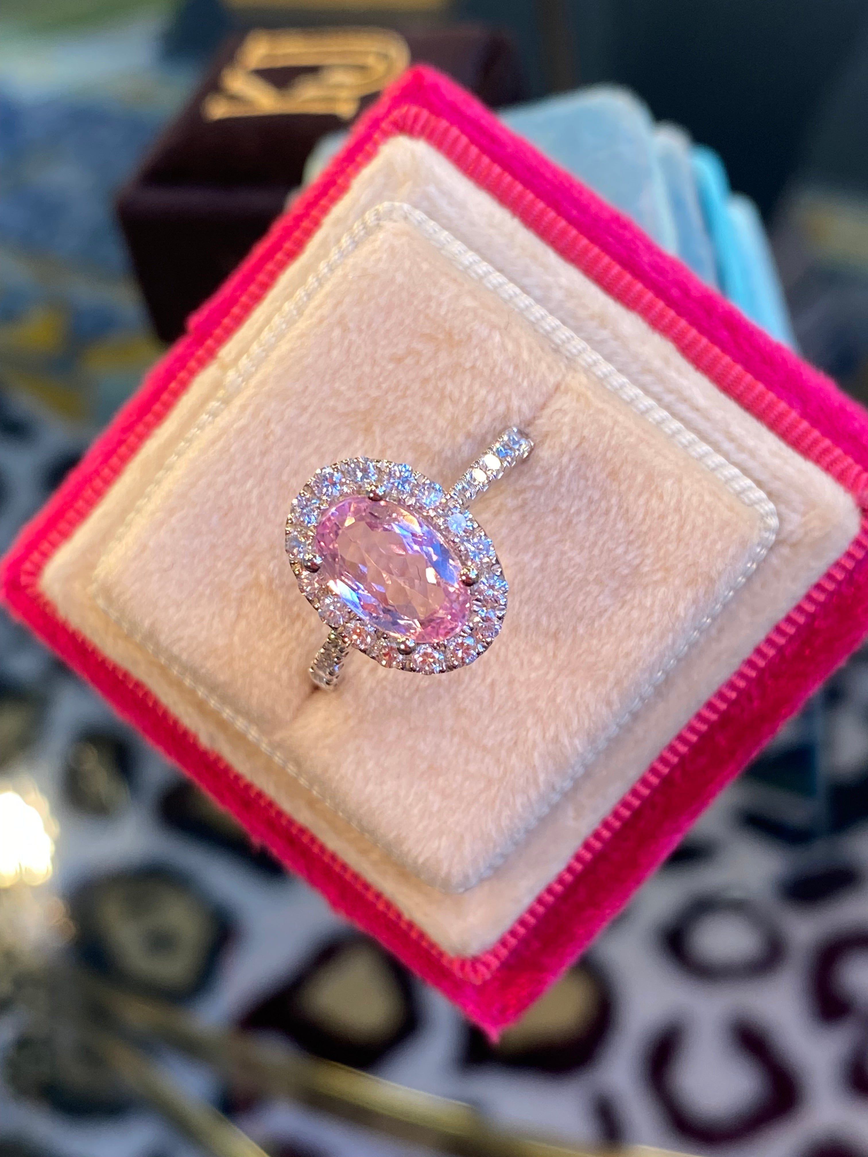1.94 CTW Oval Cut Pink Topaz and Natural Diamond Halo Ring in Platinum