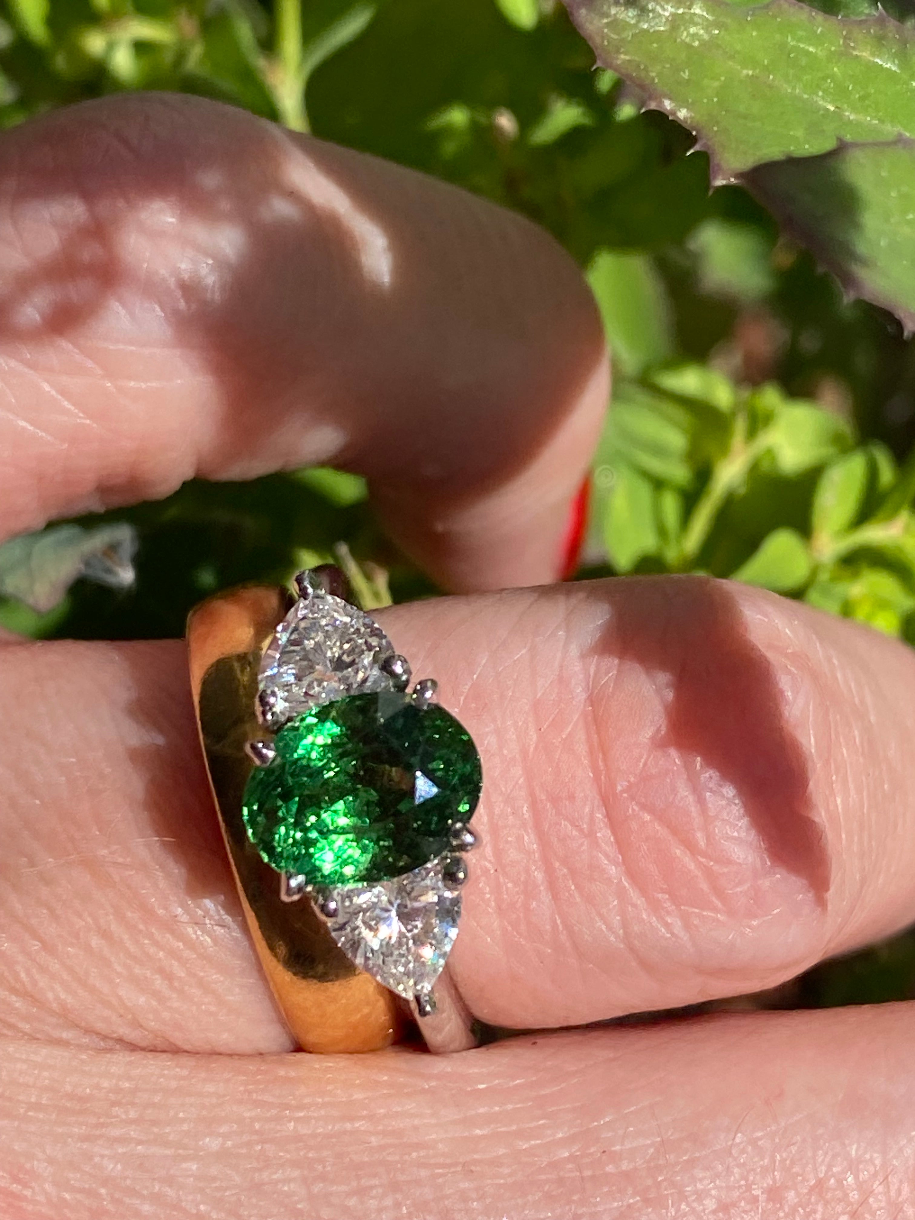 2.49 Carat Tsavorite Garnet and 0.83 Carat Diamond Three Stone Engagement Ring in Platinum