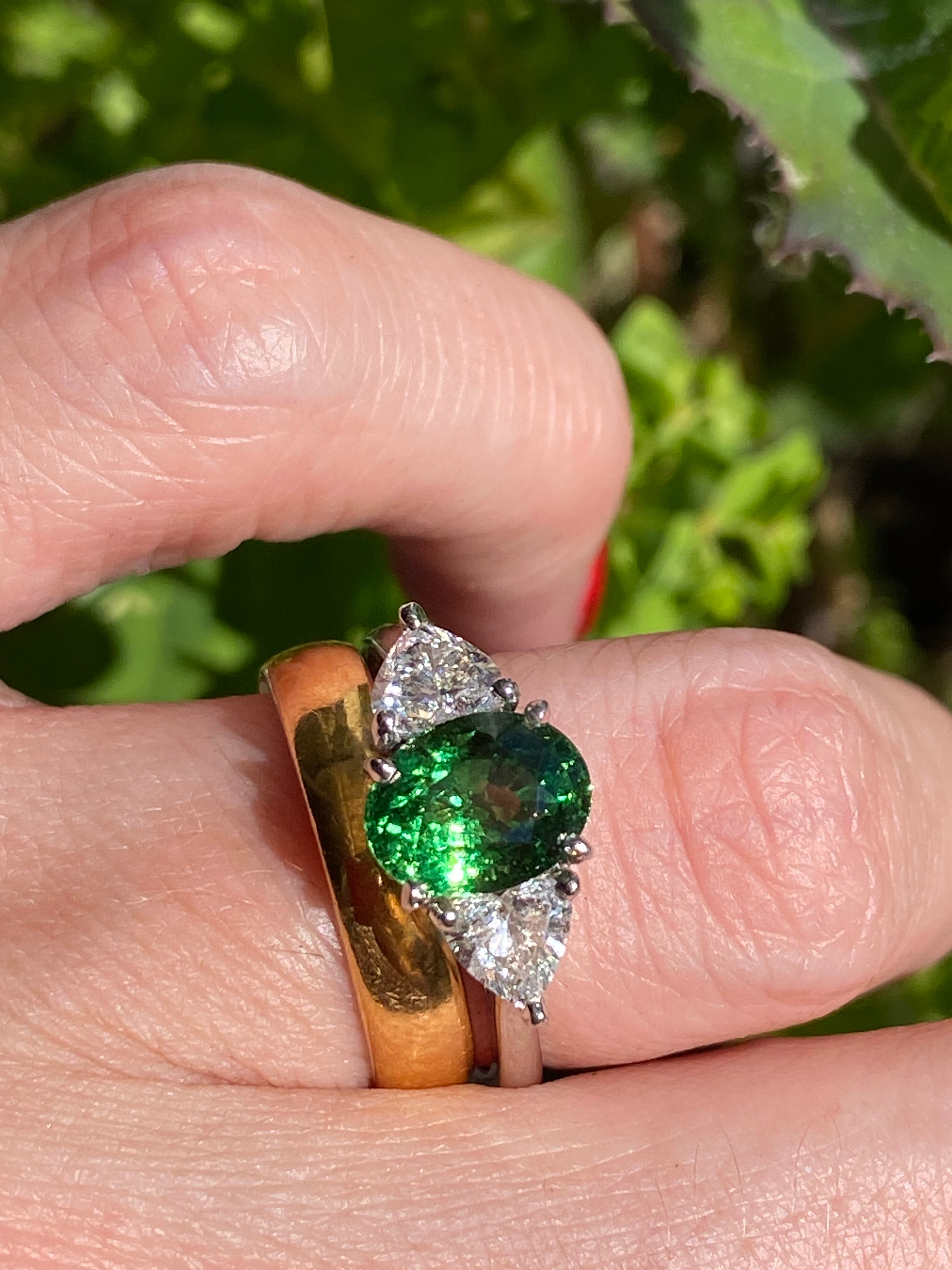 2.49 Carat Tsavorite Garnet and 0.83 Carat Diamond Three Stone Engagement Ring in Platinum