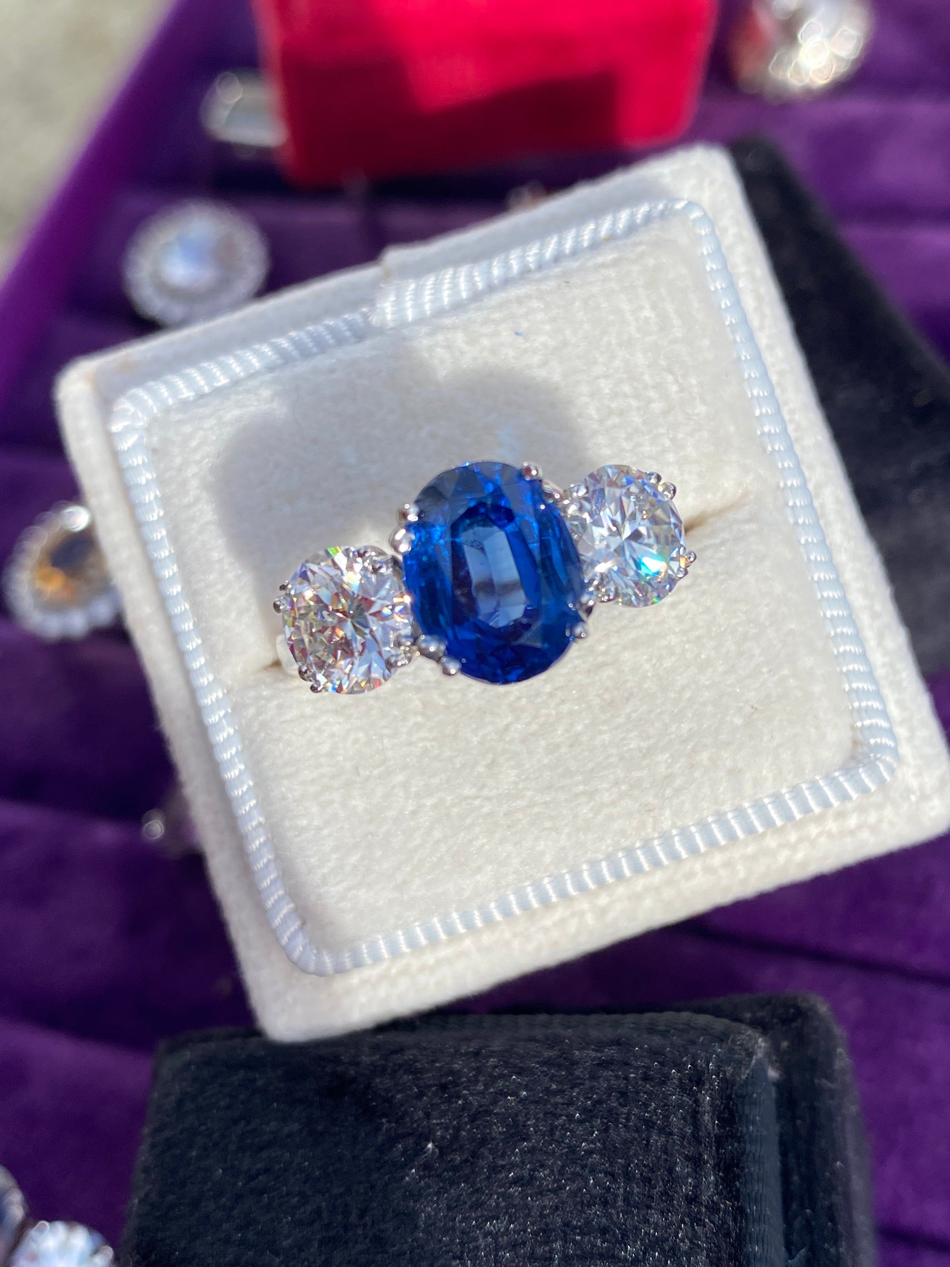 4.41 CTW Oval Cut Kyanite and Moissanite Three Stone Ring in Sterling Silver