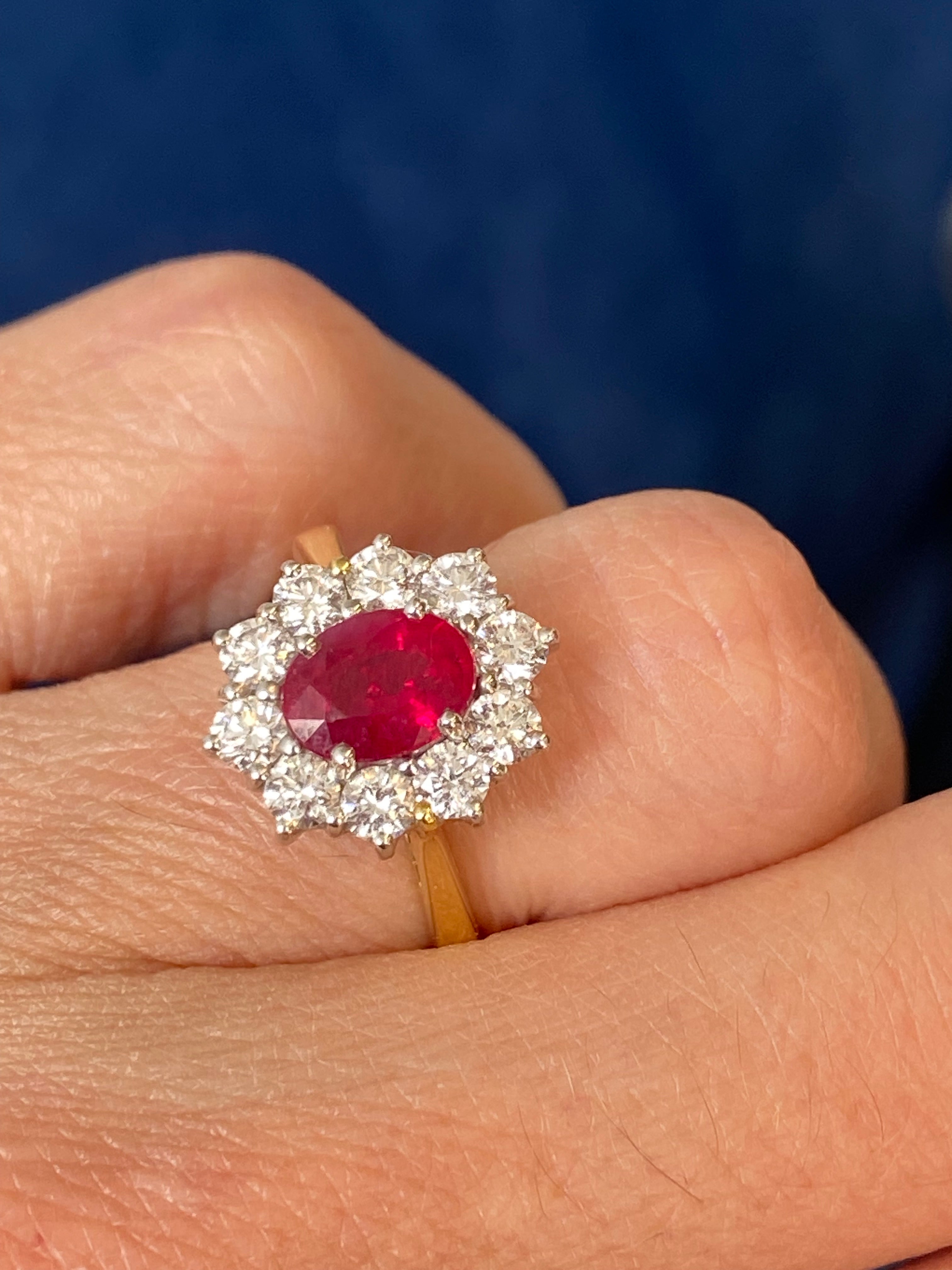 Breathtaking Ruby and Natural Diamond Halo Ring in 18ct Gold