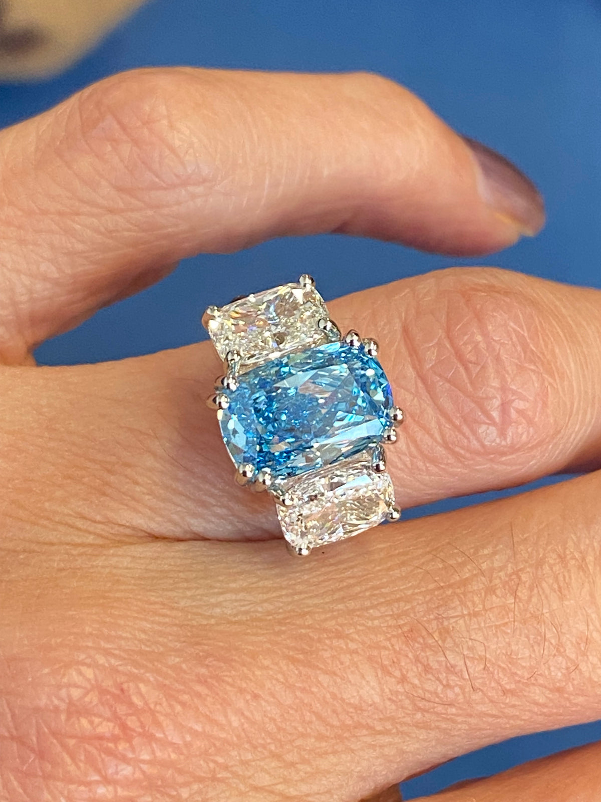 6.60 CTW Fancy Blue Cushion Cut Lab Diamond Graduated Three Stone Ring in Platinum