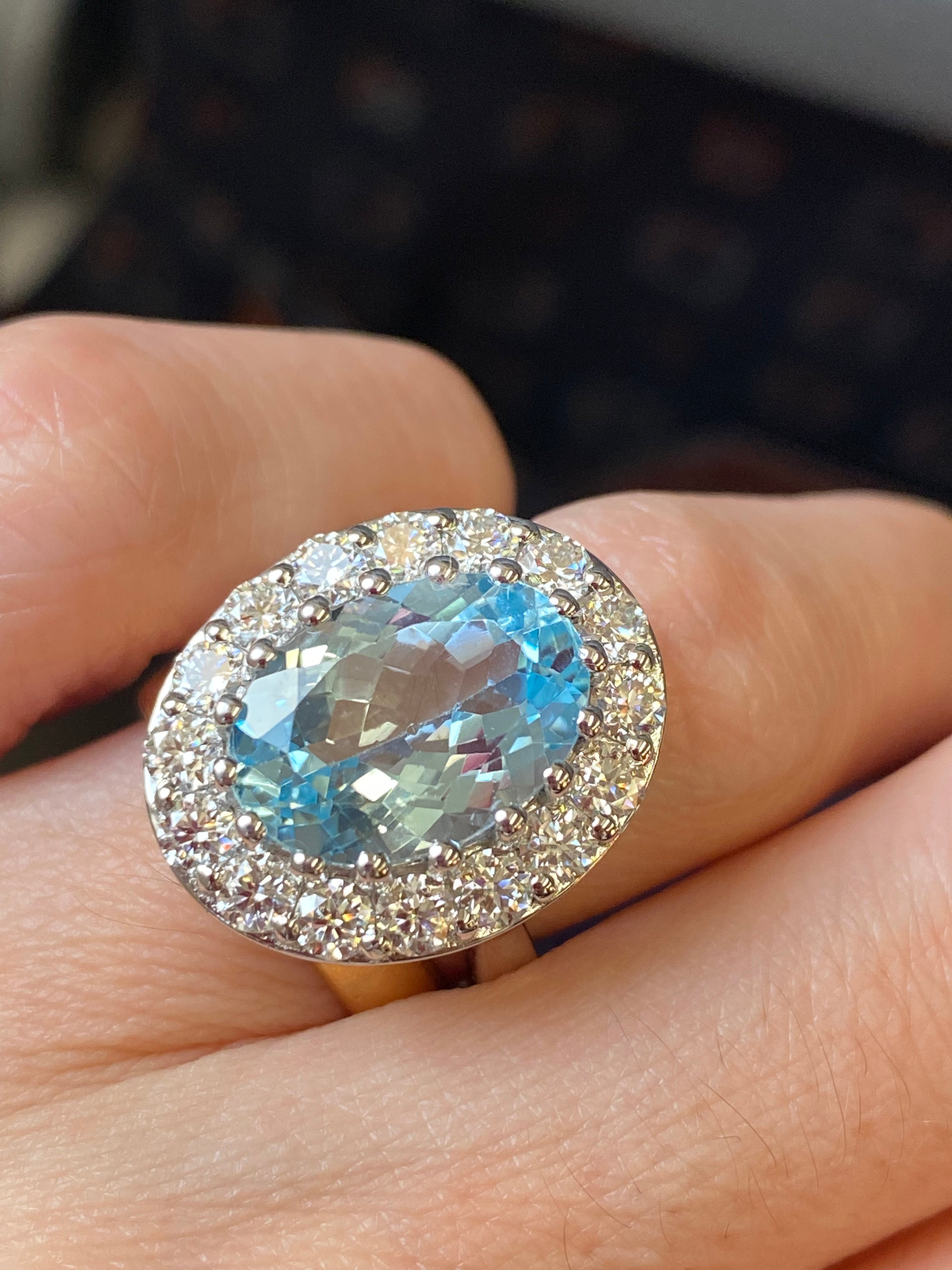 9.60 CTW Oval Cut Blue Topaz and Moissanite Halo Cocktail Ring in Sterling Silver