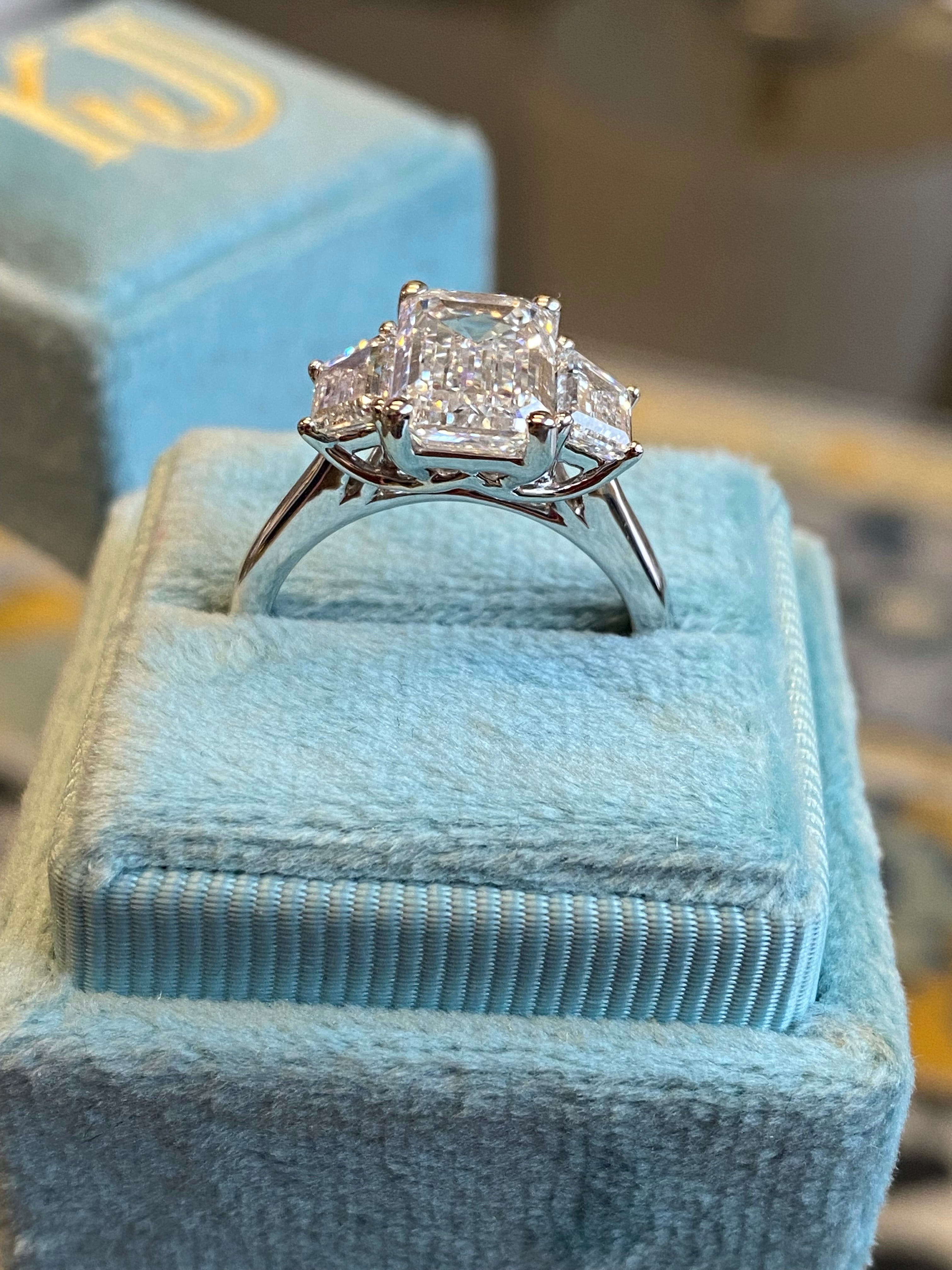 3.93 CTW Emerald and Trapezoid Cut D Colour VS1 Lab Diamond Three Stone Ring in Platinum