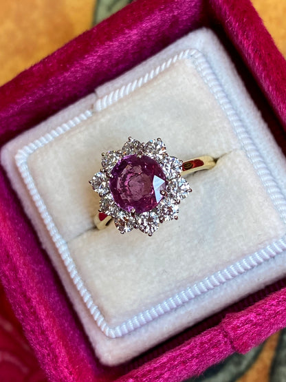 2.93 CTW Round-Cut Ruby and Natural Diamond Halo Ring in 18ct White and Yellow Gold