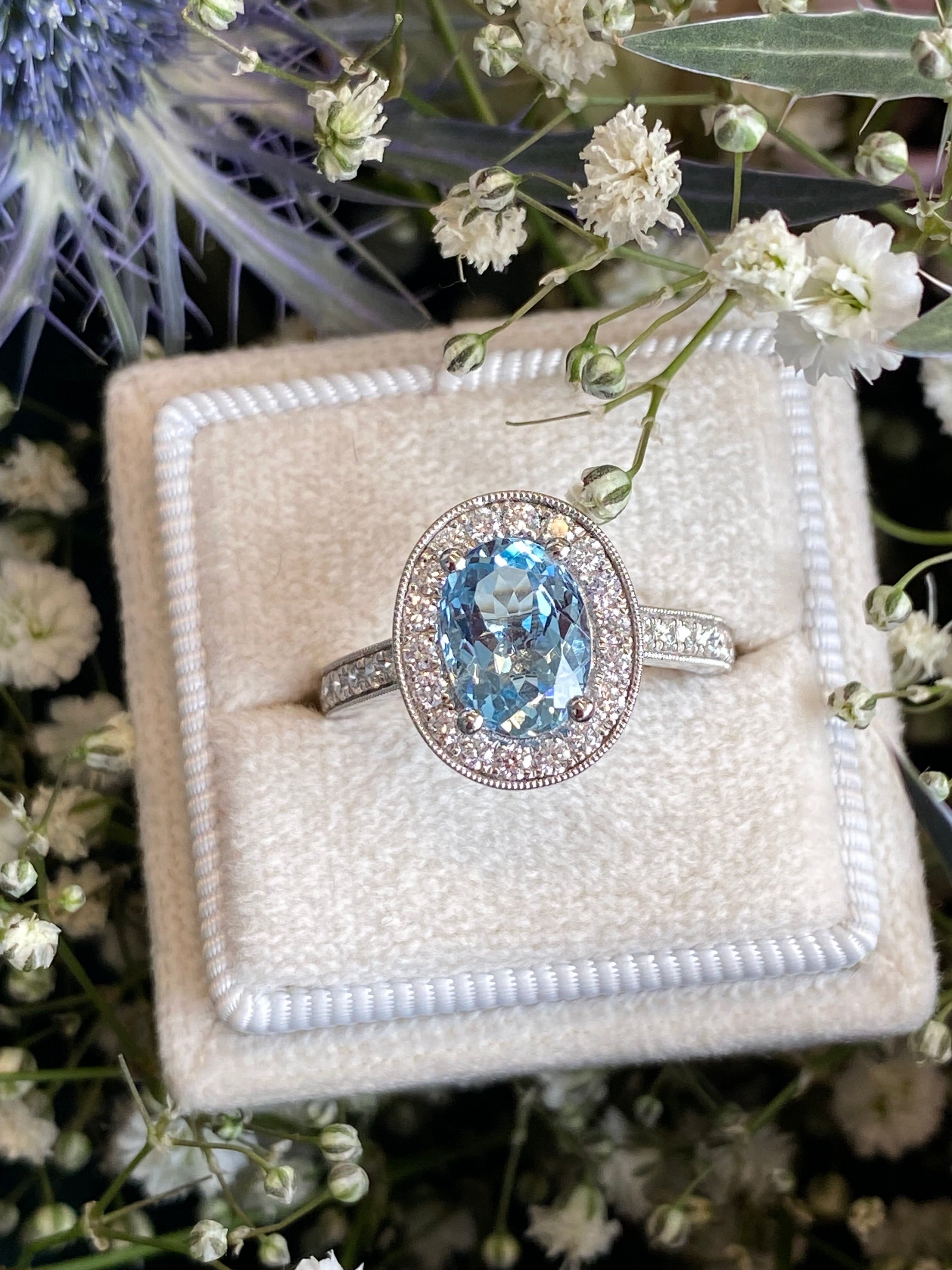 2.33 CTW Oval Cut Aquamarine and Natural Diamond Halo Engagement Ring in 18ct White Gold