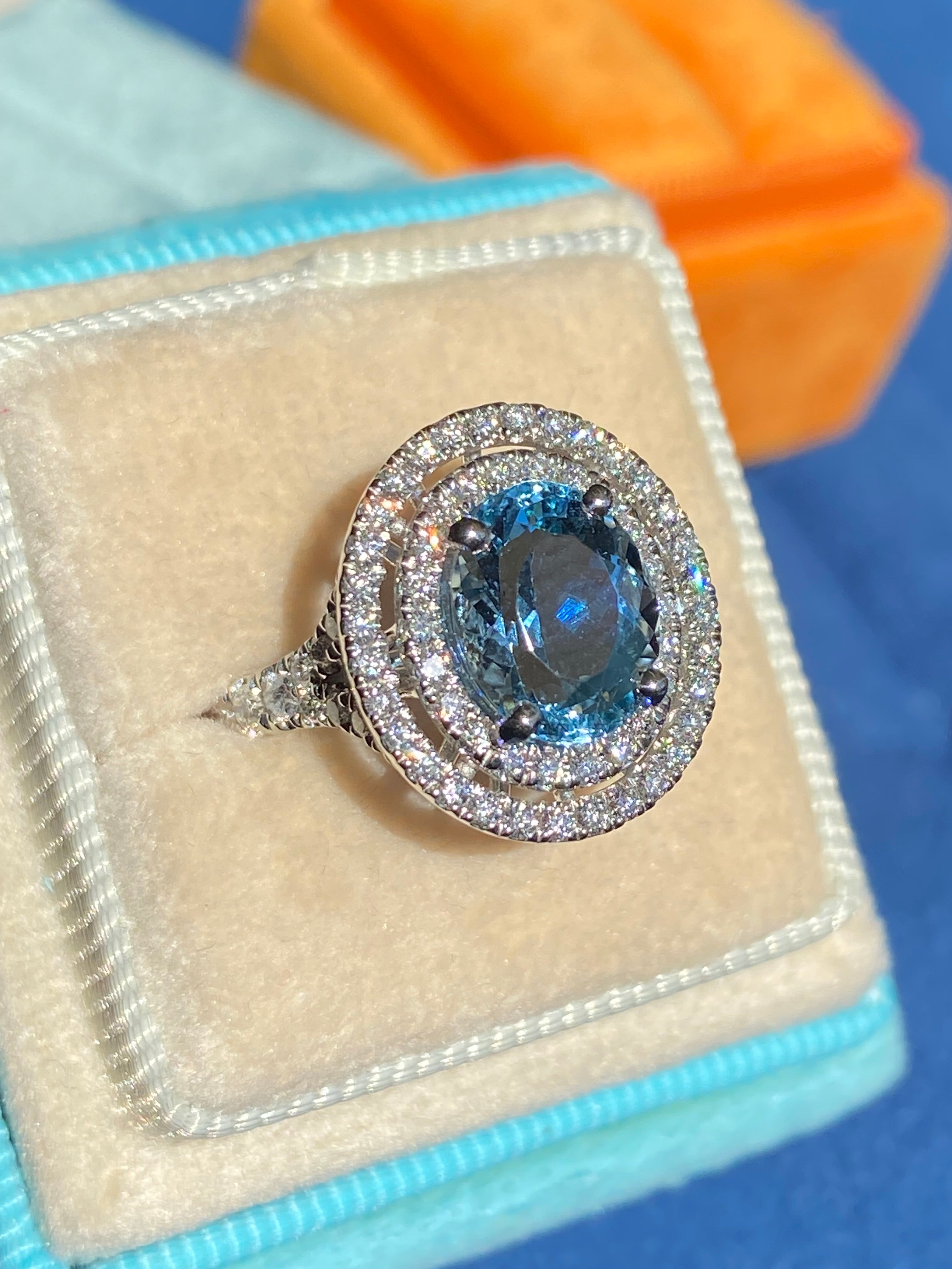 3.23 CTW Oval Cut Aquamarine and Natural Diamond Double Halo Engagement Ring in Platinum