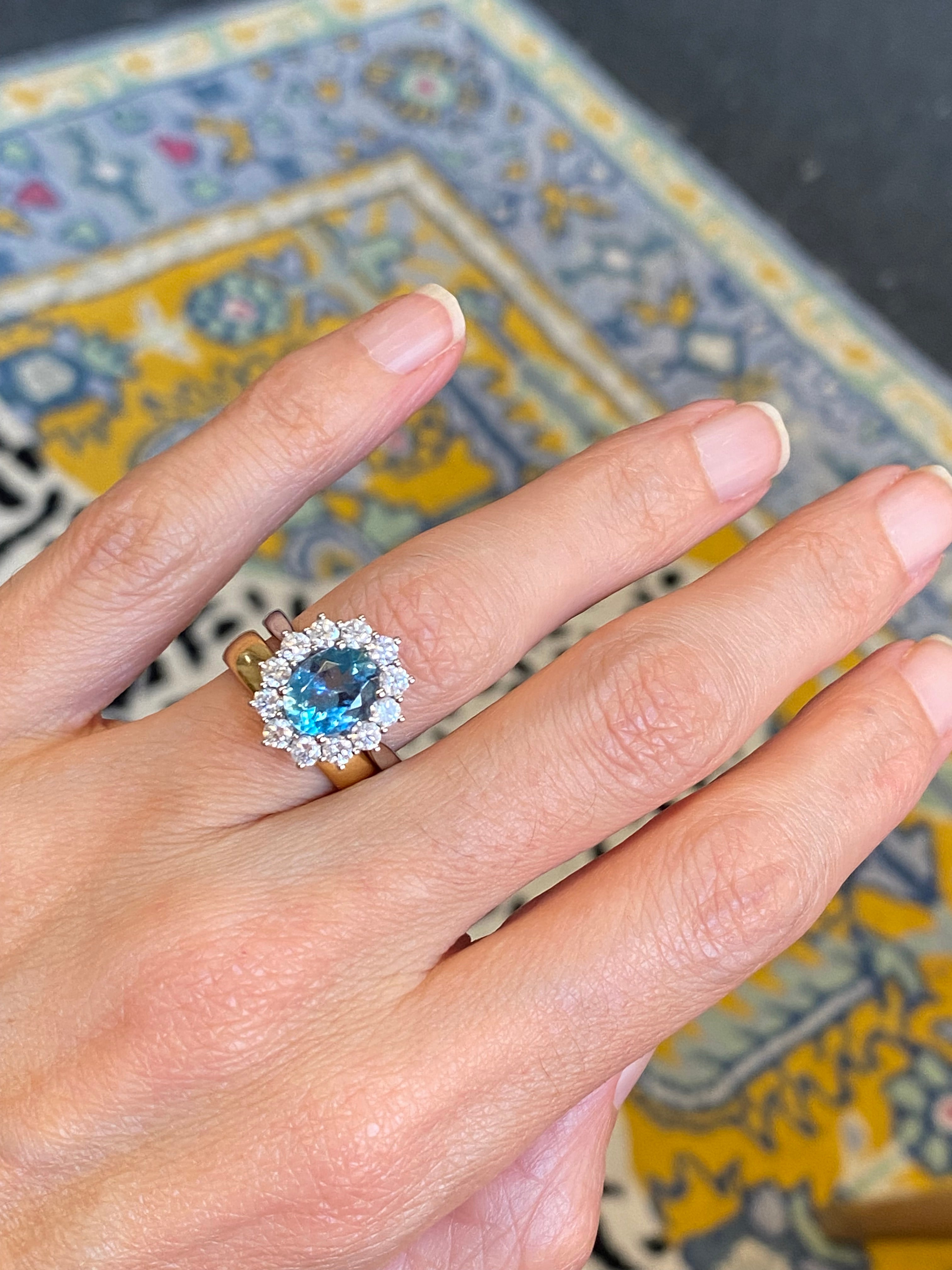 2.68 CTW Oval Cut Aquamarine and Natural Diamond Halo Engagement Ring in Platinum