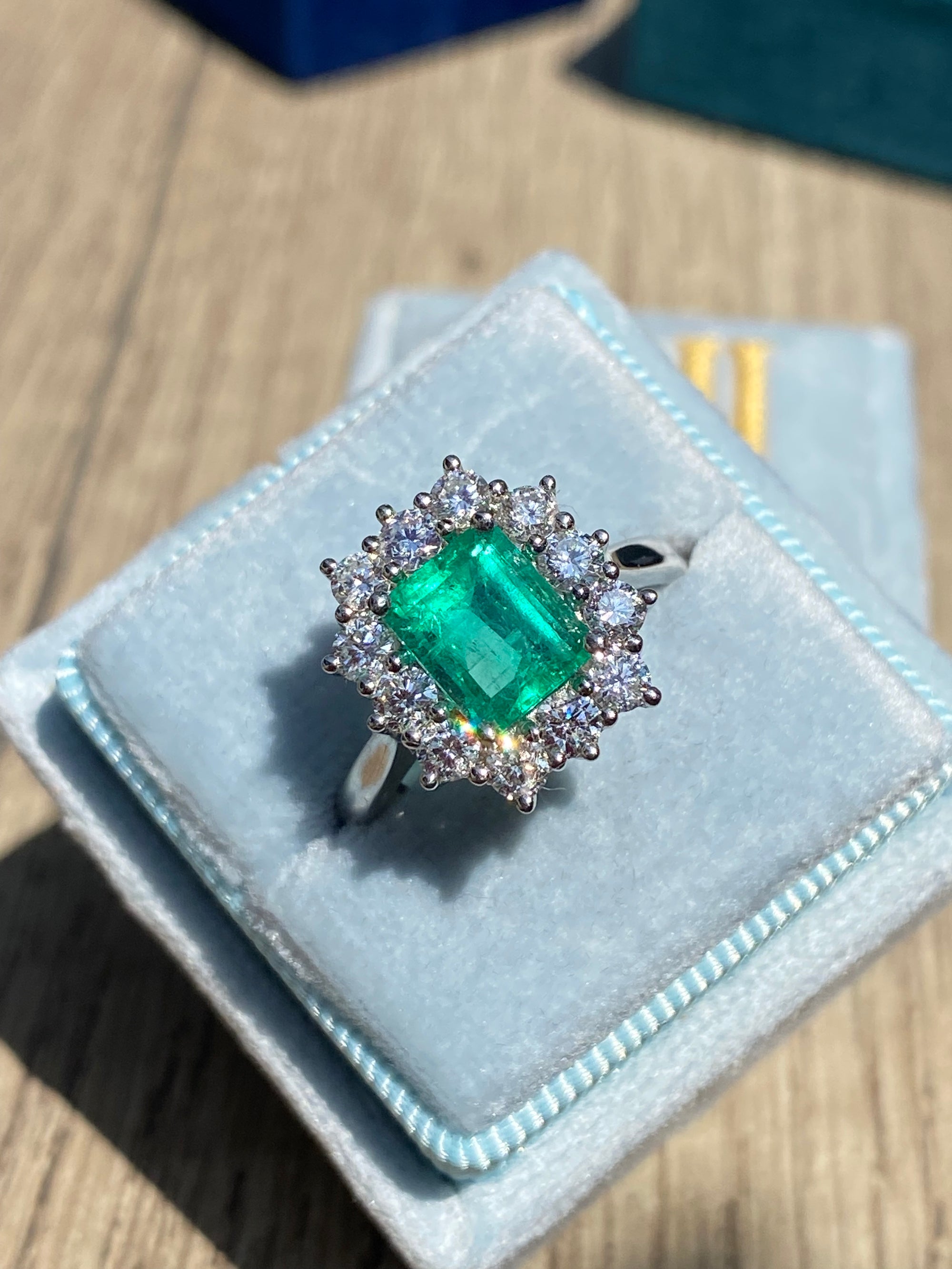 2.34 CTW Emerald Cut Colombian Emerald and Natural Diamond Halo Ring in Platinum