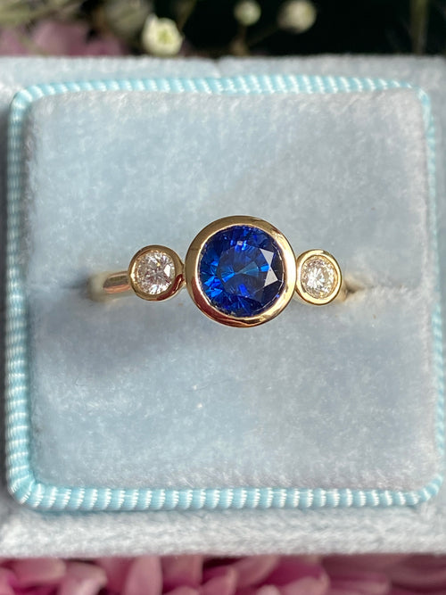 1.41 Carat Blue Ceylon Sapphire and 0.18 CTW Natural Diamond Halo Ring in 18ct Yellow Gold