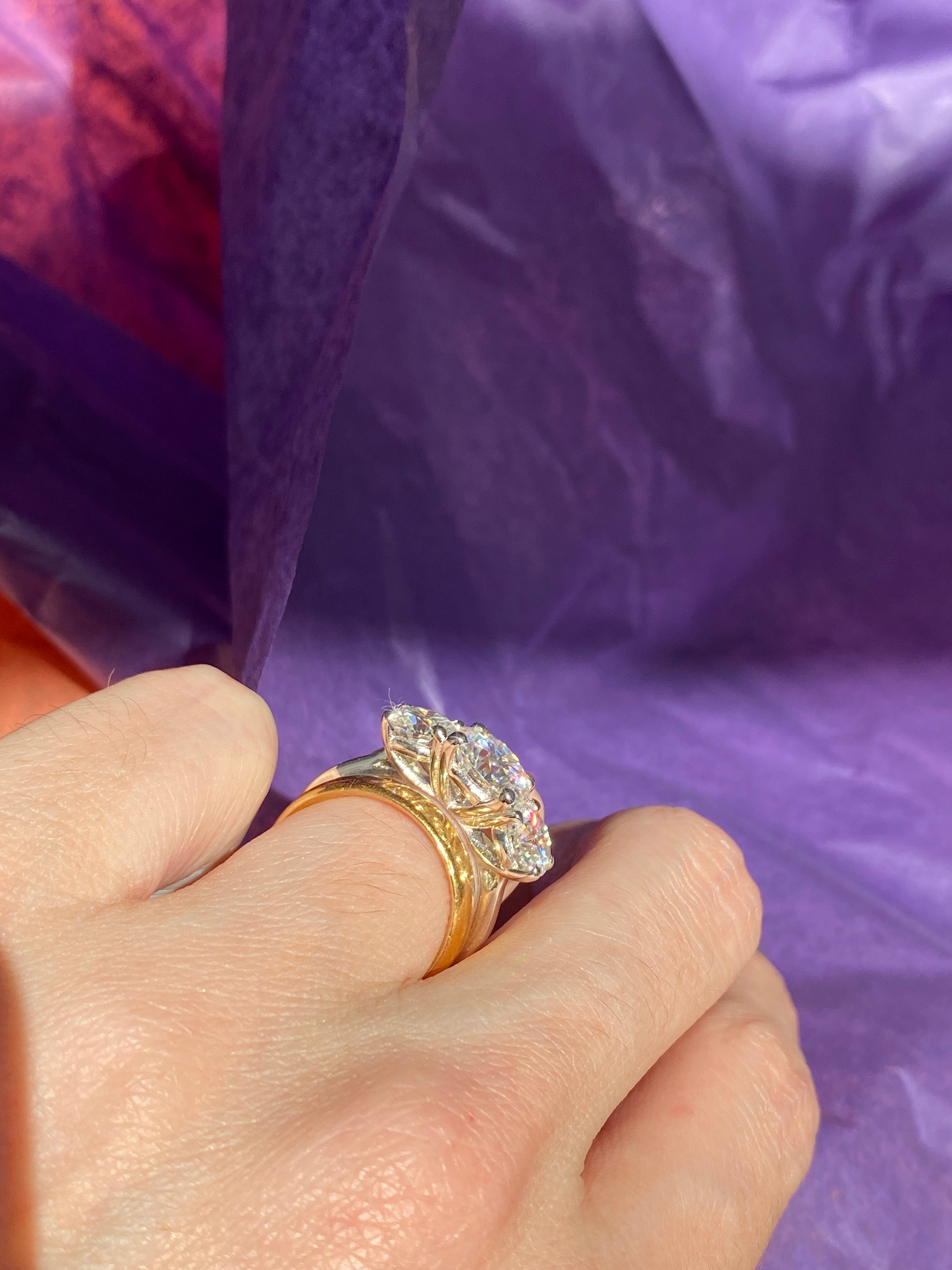 4.00 CTW Round Cut Moissanite Three Stone Ring in Sterling Silver