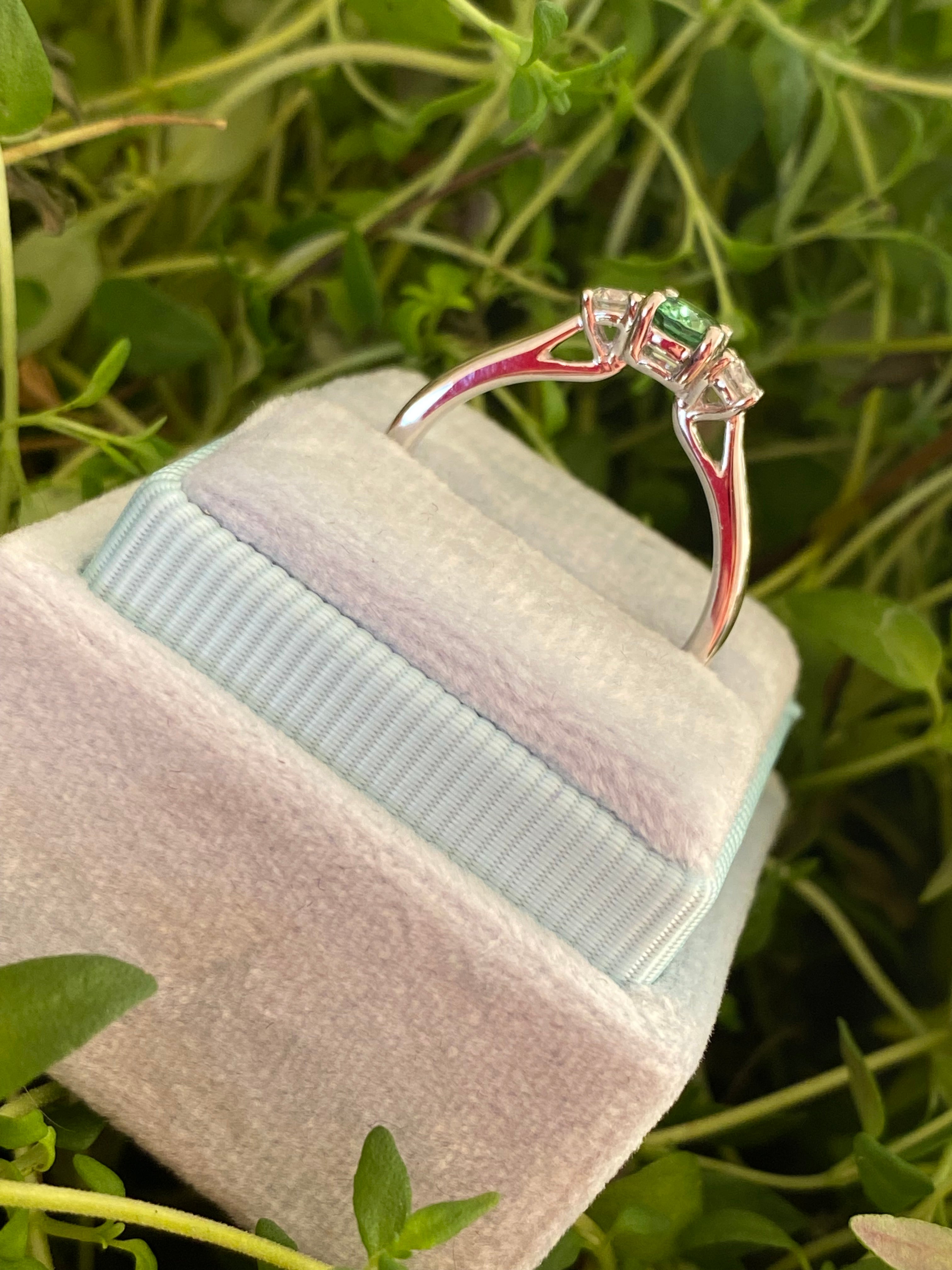 0.40 Carat Tsavorite Garnet and 0.20 Carat Diamond Three Stone Engagement Ring in Platinum
