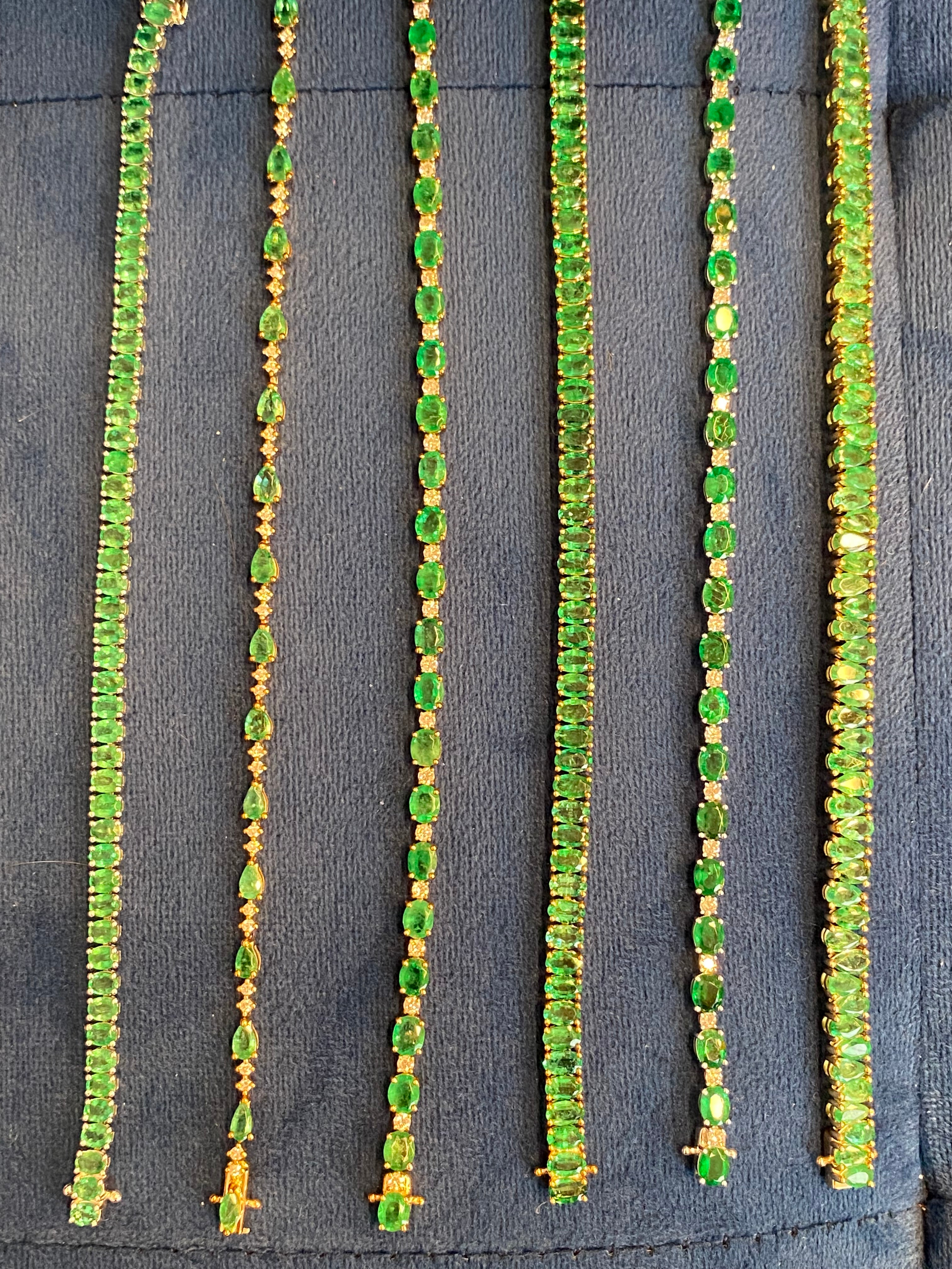 4.22 CTW Emerald and Natural Diamond Line Tennis Bracelet in 9ct Yellow Gold