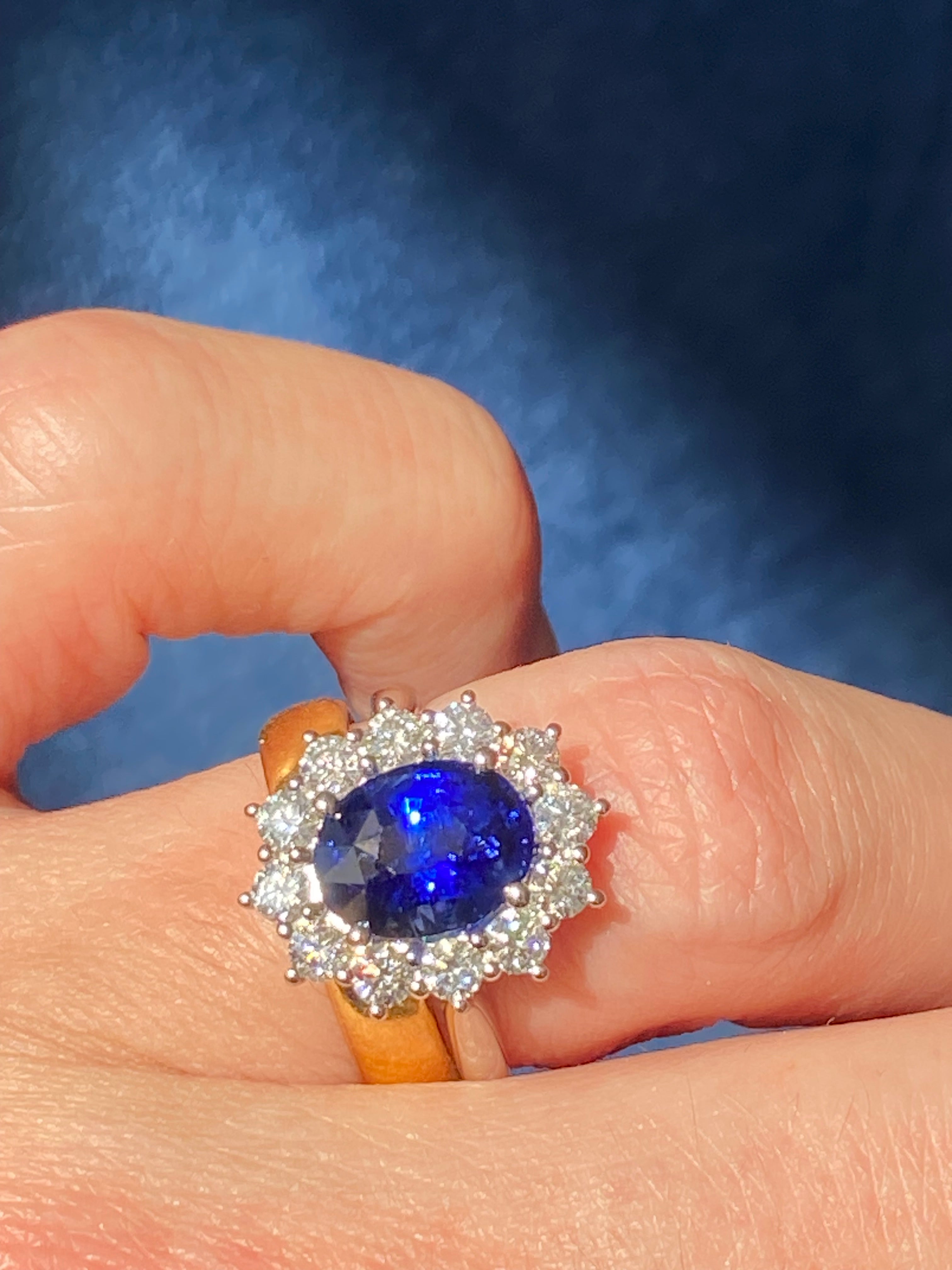 3.17 Carat Blue Ceylon Sapphire and 0.87 CTW Natural Diamond Halo Ring in Platinum