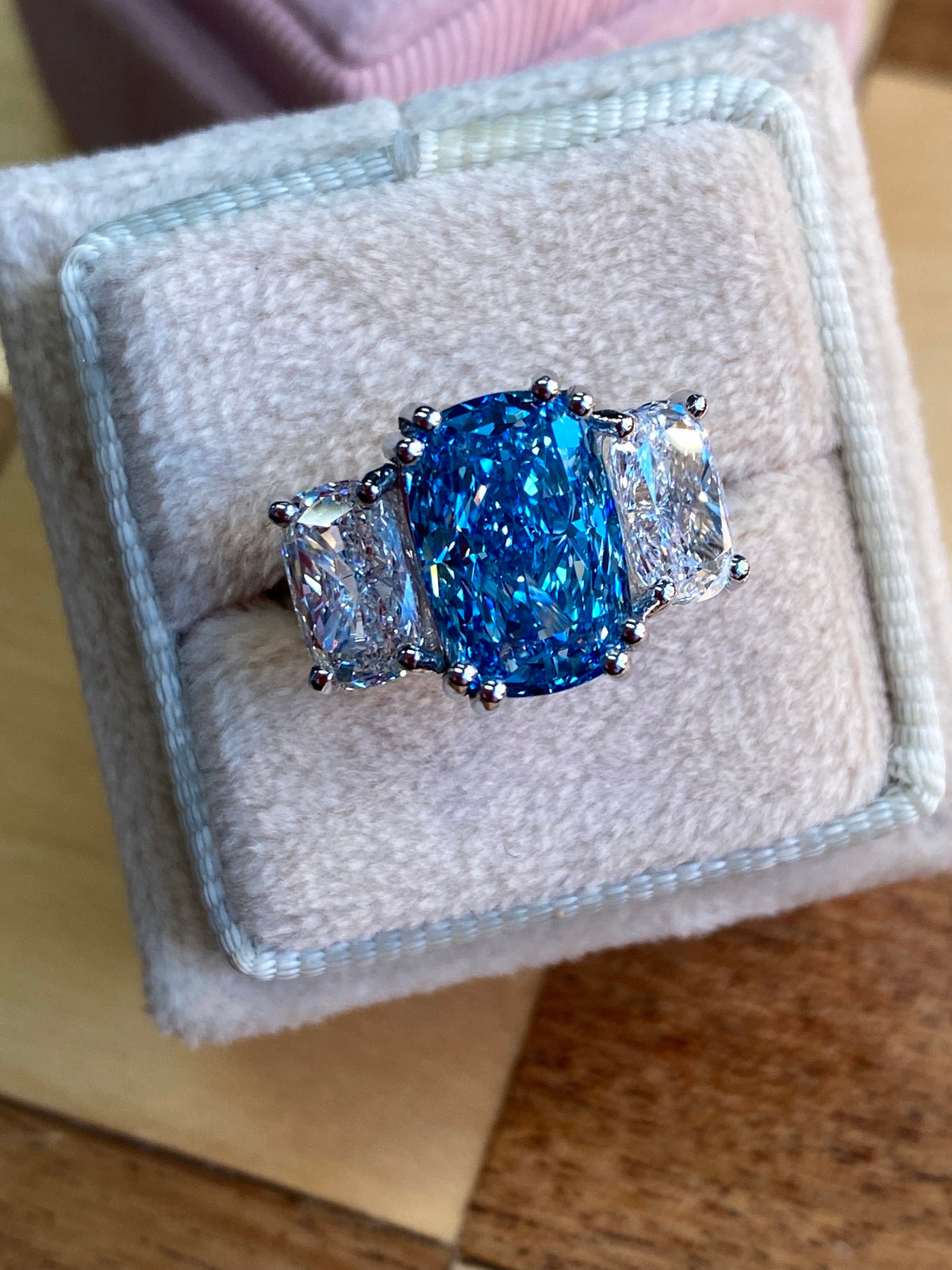 6.60 CTW Fancy Blue Cushion Cut Lab Diamond Graduated Three Stone Ring in Platinum