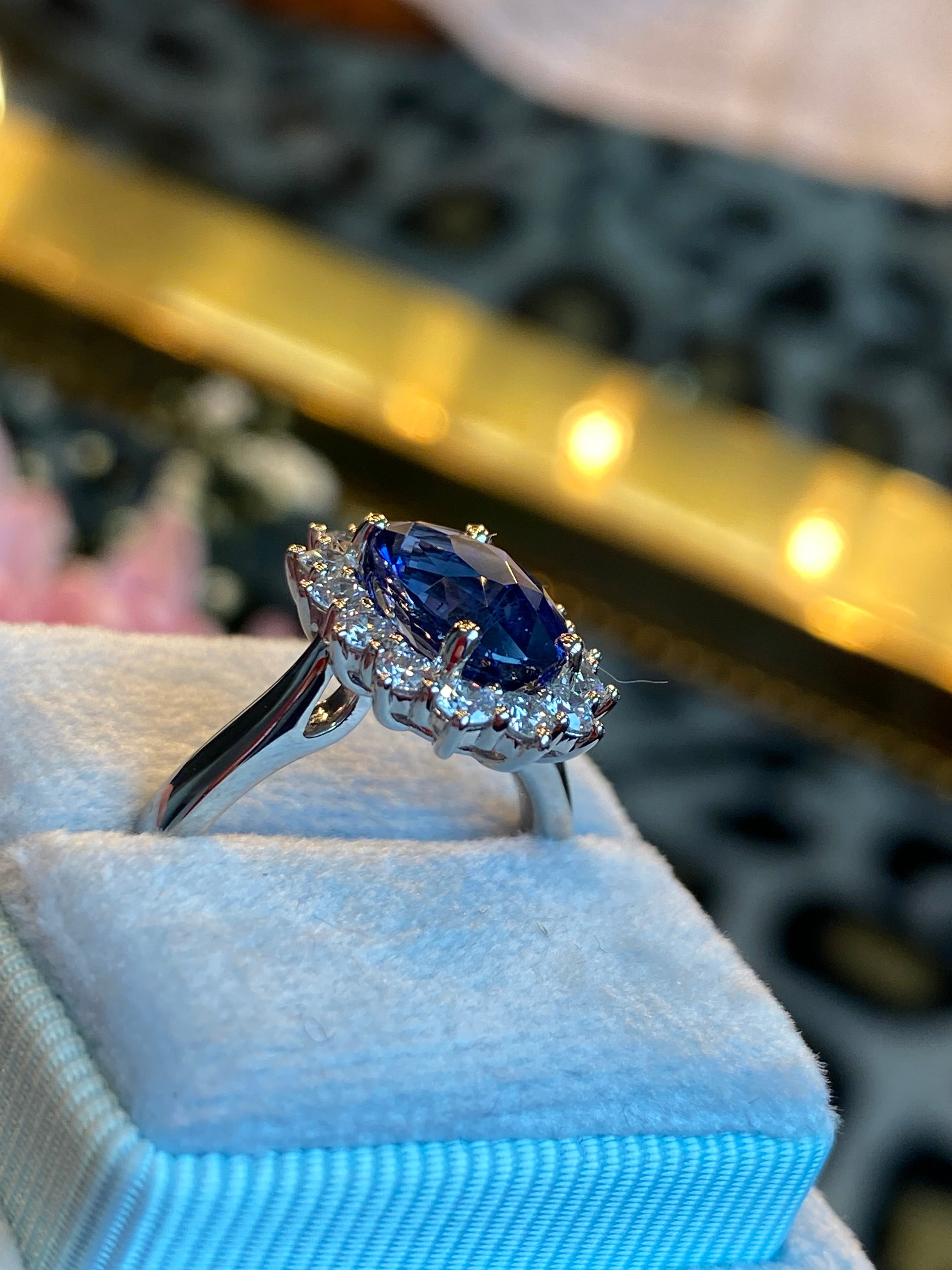 3.04 Carat Blue Ceylon Sapphire and 0.63 CTW Natural Diamond Halo Ring in Platinum