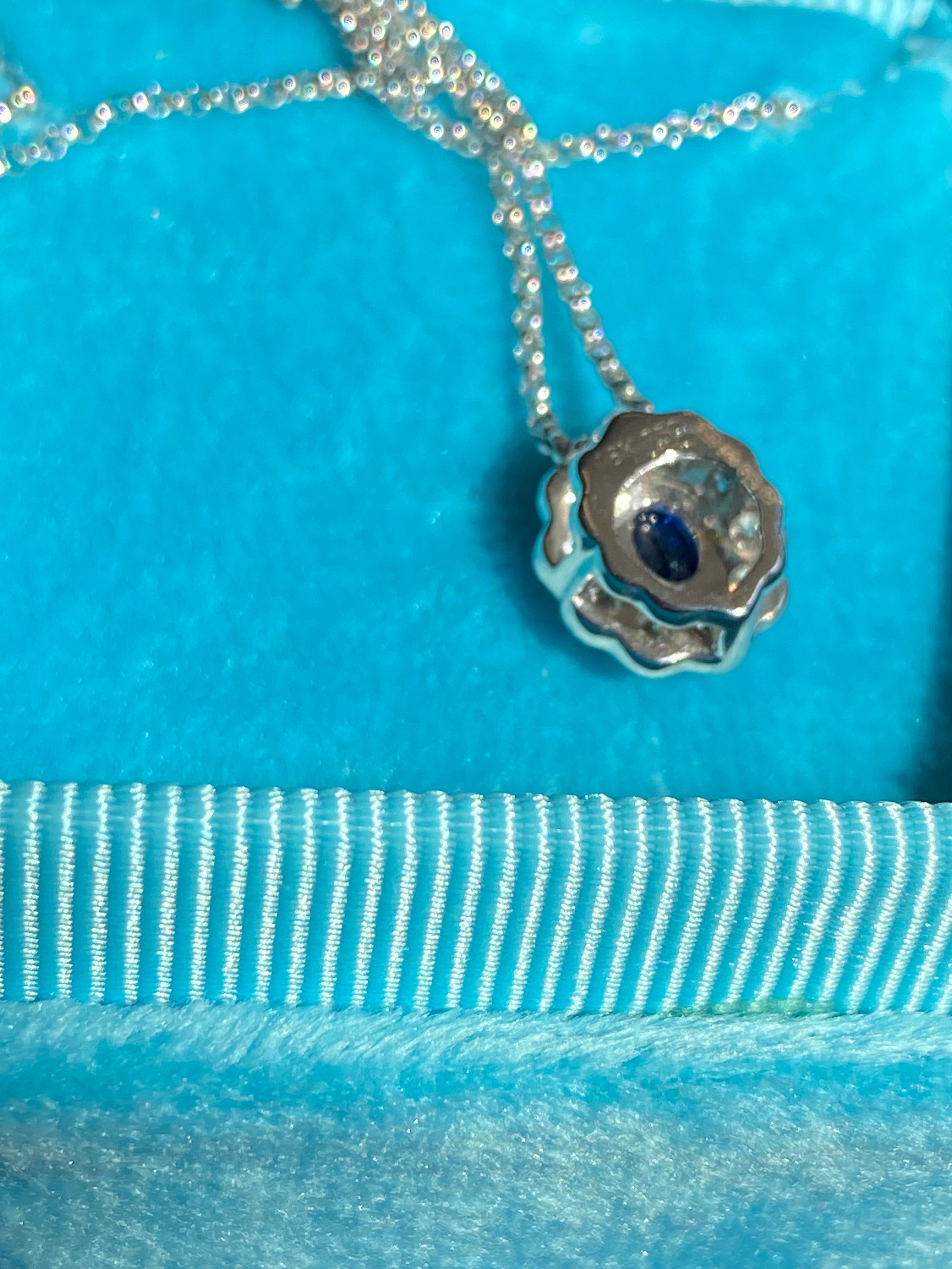 0.73 CTW Sapphire and Natural Diamond Pendant Necklace in 18ct White Gold
