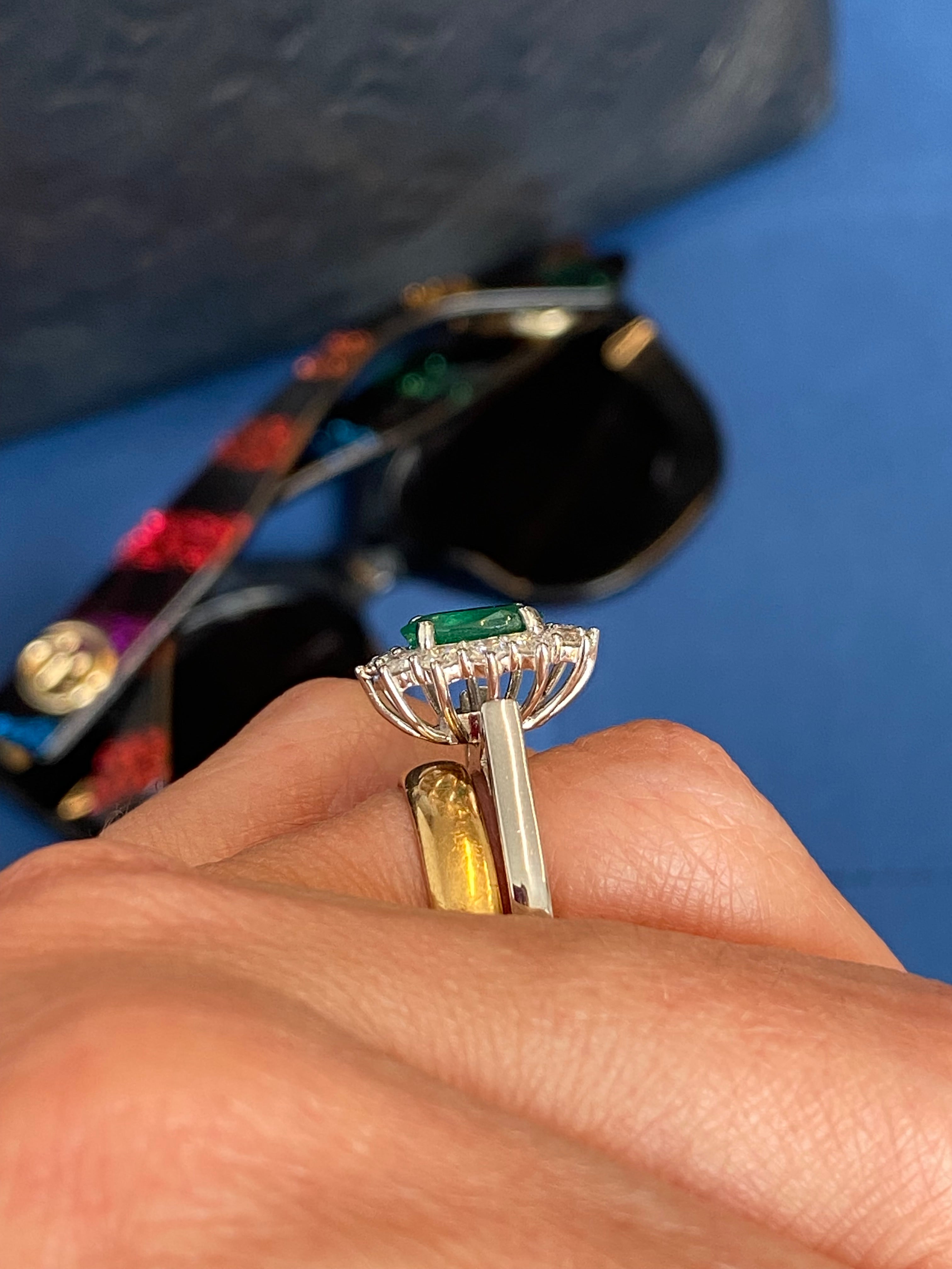 1.53 Carat Cushion Cut Emerald and 0.96 CTW Natural Diamond Halo Ring in Platinum