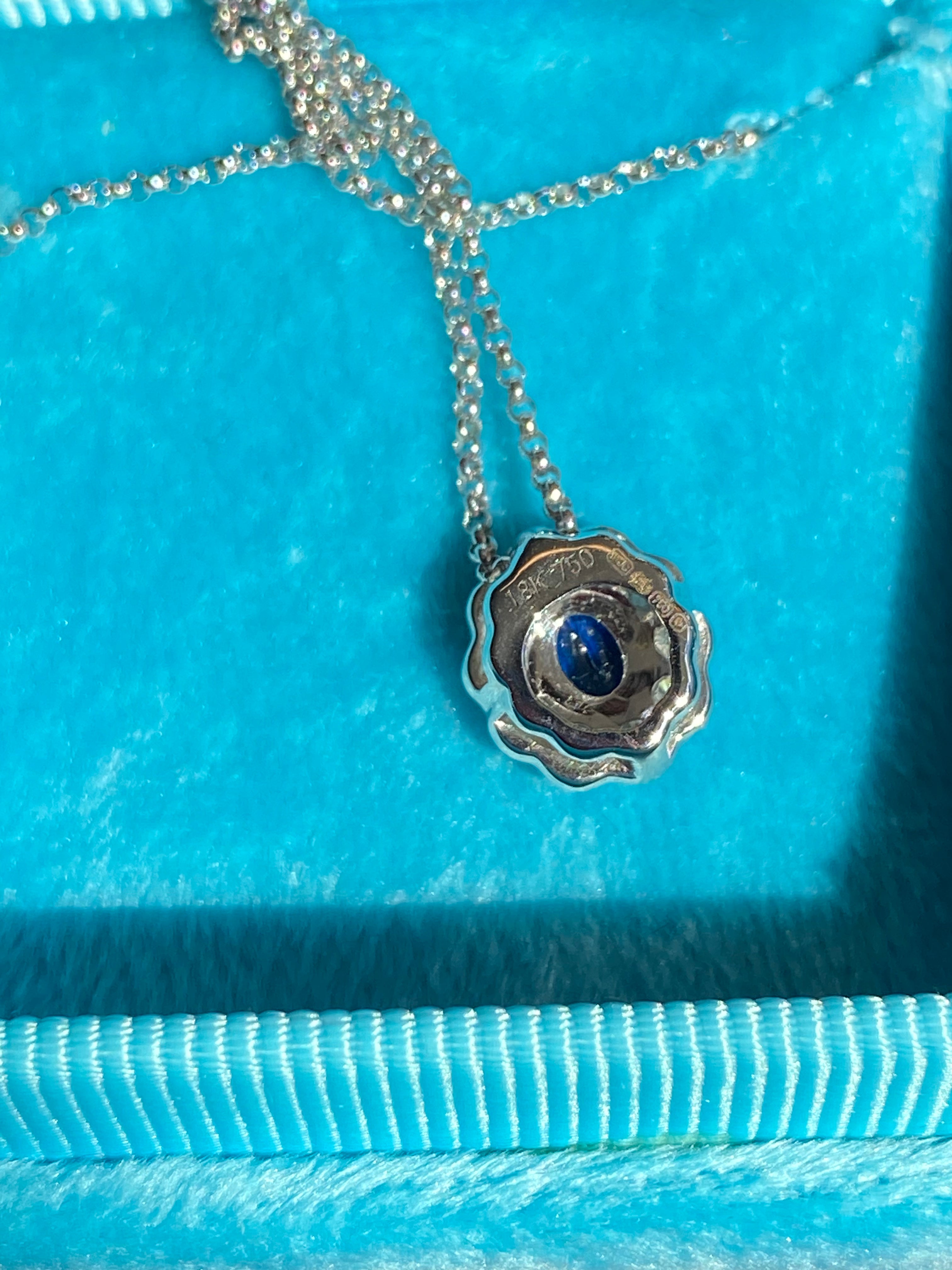 0.73 CTW Sapphire and Natural Diamond Pendant Necklace in 18ct White Gold
