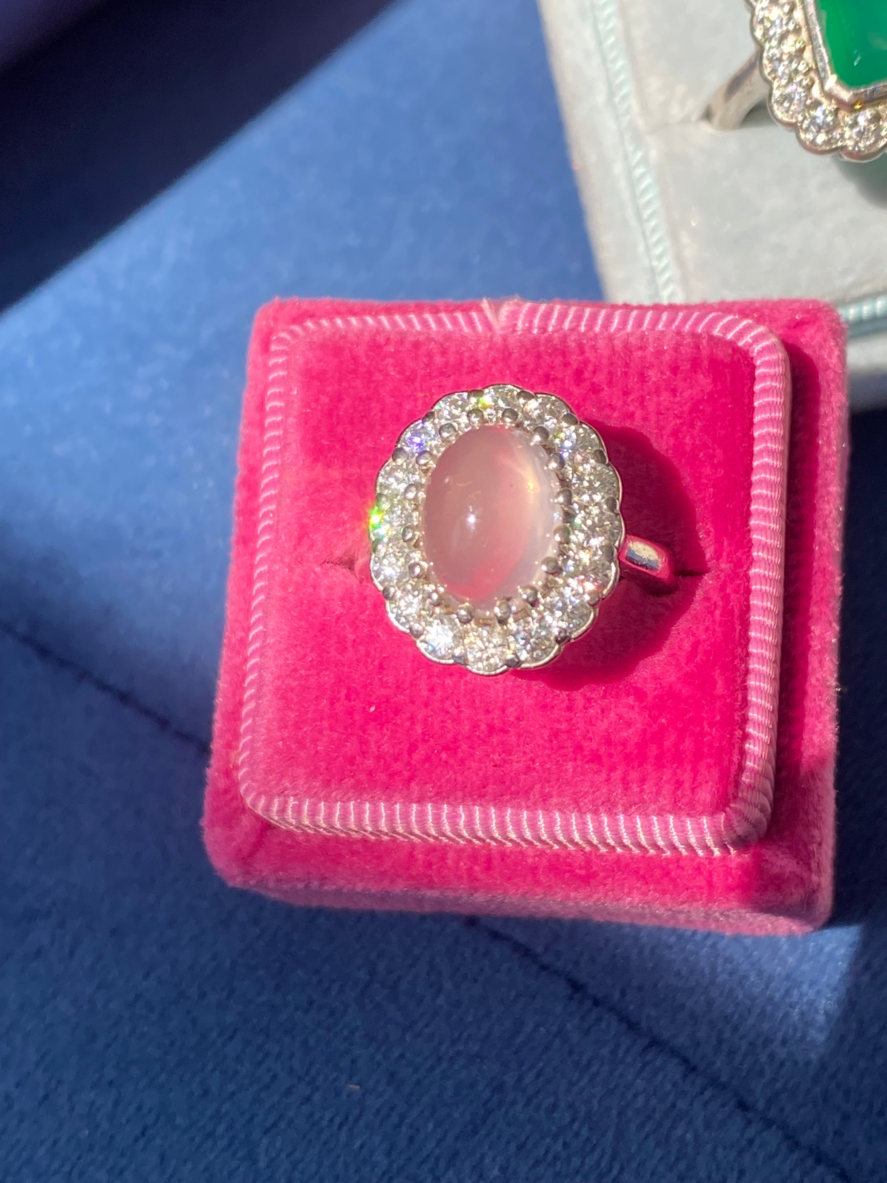 4.50 CTW Oval Cabochon Cut Rose Quartz and Moissanite Halo Cocktail Ring in Sterling Silver