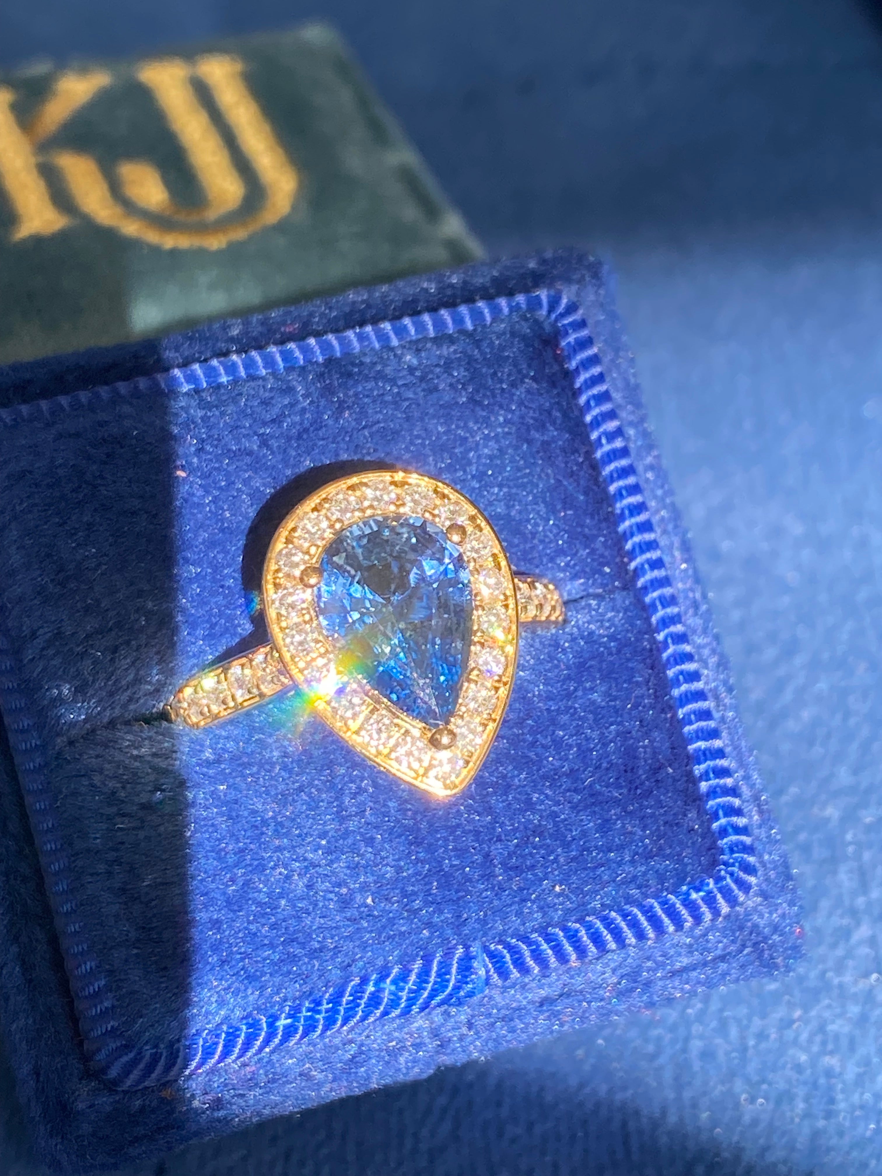 2.07 Carat Pear Cut Teal Sapphire and 0.48 CTW Natural Diamond Ring in 18ct Yellow Gold