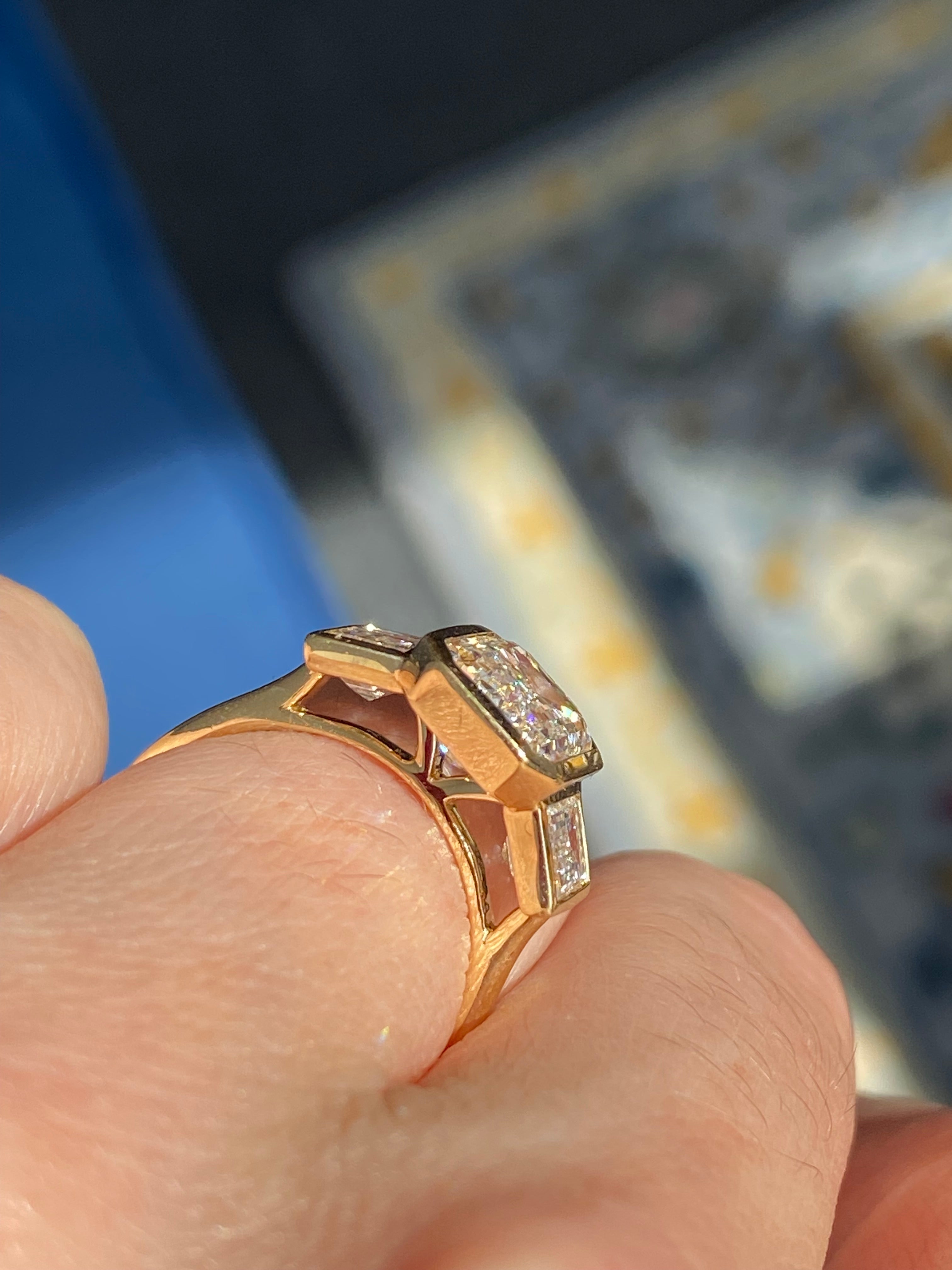 4.32 CTW Emerald Cut Bezel Set Lab Diamond Ring in 18ct Yellow Gold