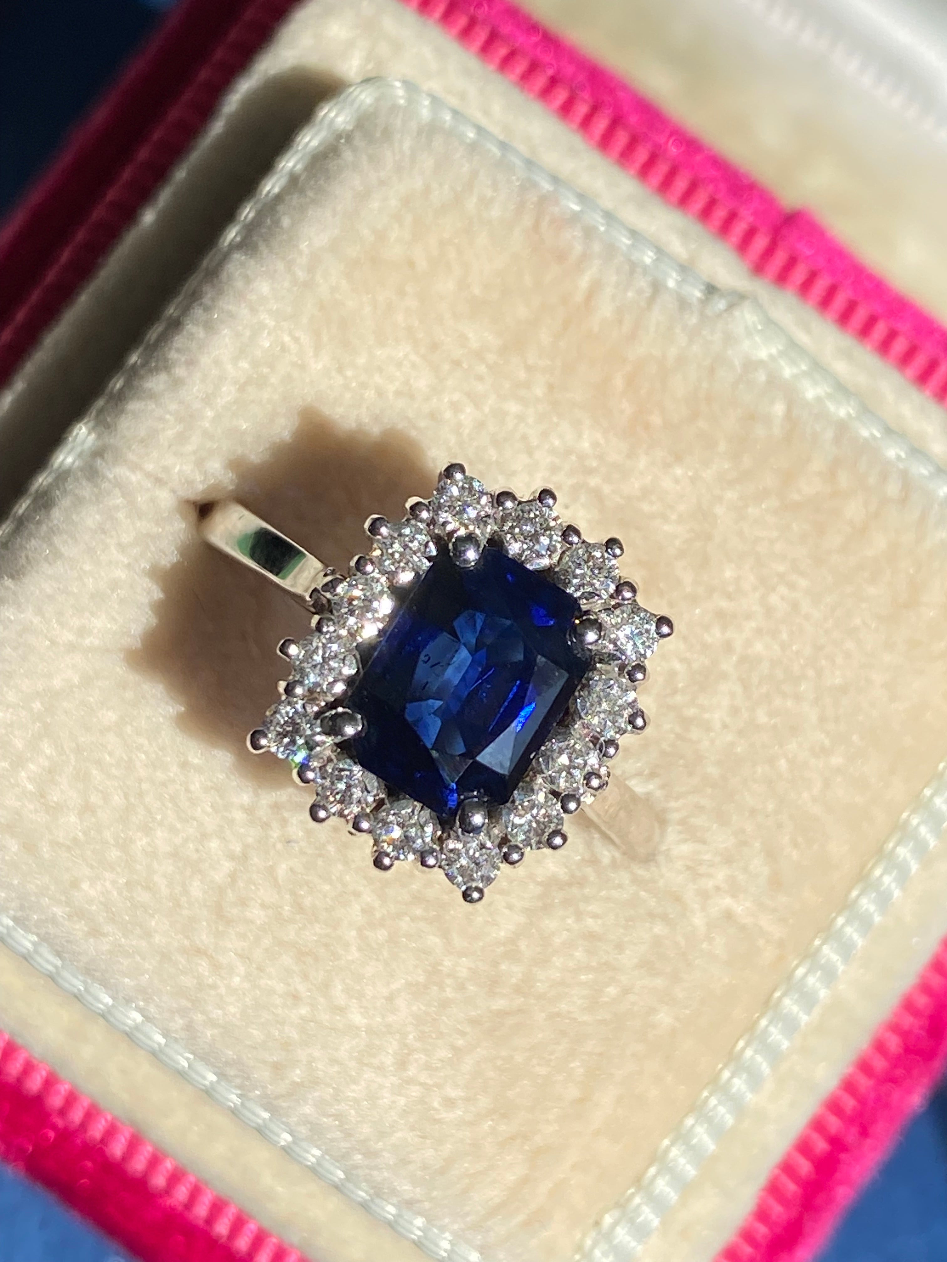 Vintage 2.05 Carat Sapphire and Natural Diamond Halo Ring in Platinum