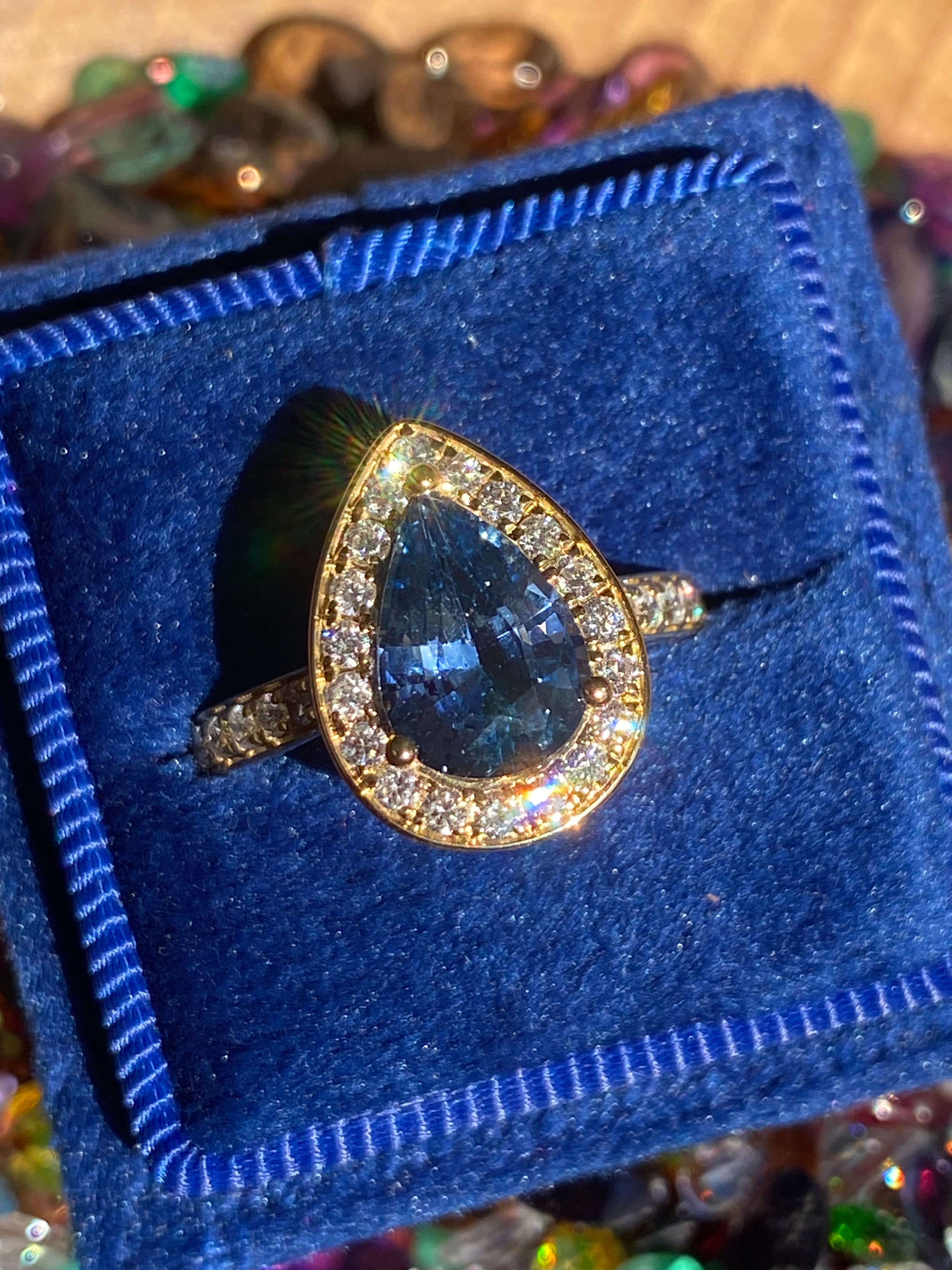 2.07 Carat Pear Cut Teal Sapphire and 0.48 CTW Natural Diamond Ring in 18ct Yellow Gold