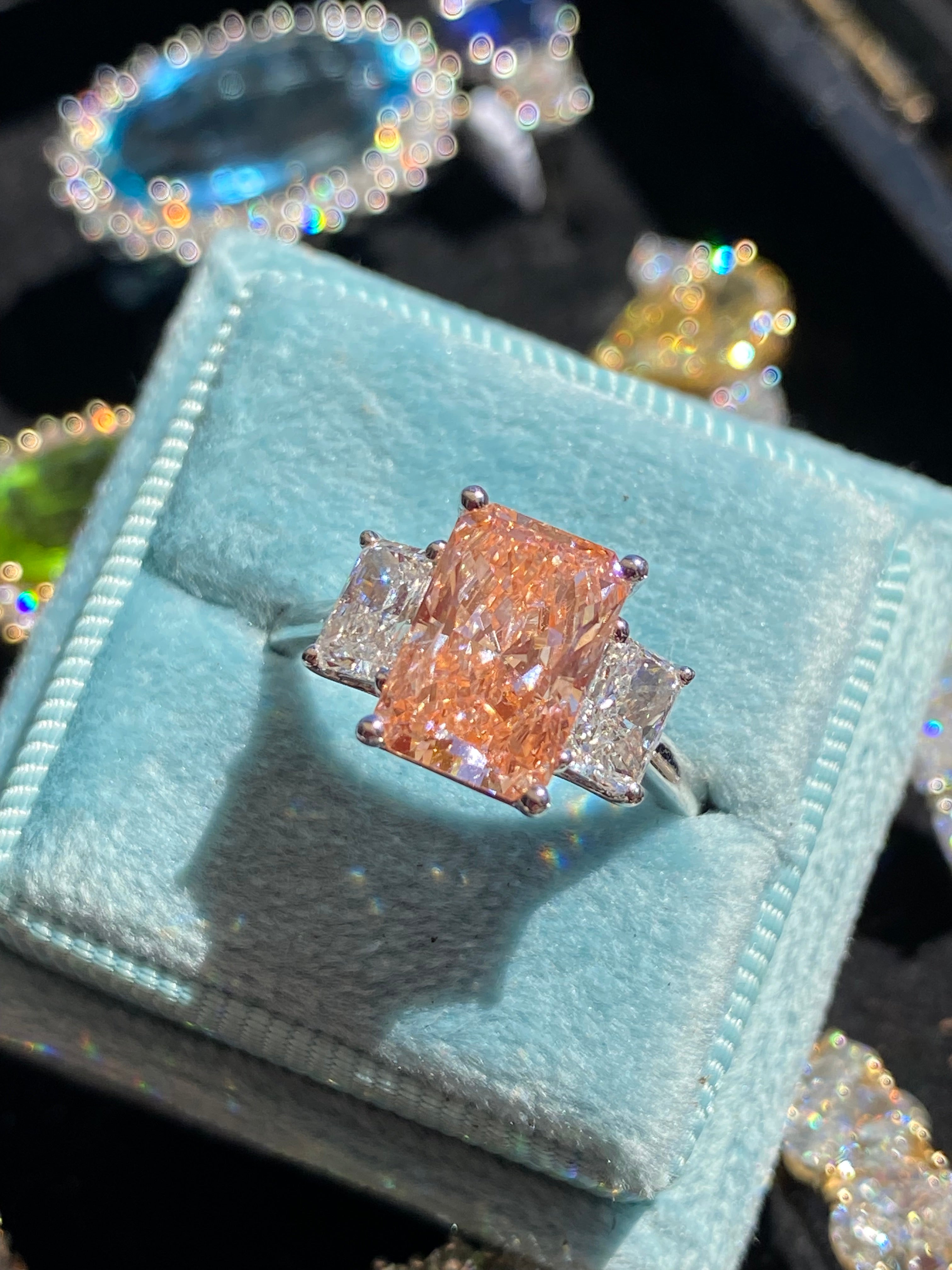 4.12 CTW Fancy Radiant Cut Pink Lab Grown Diamond Graduated Three Stone Ring in Platinum