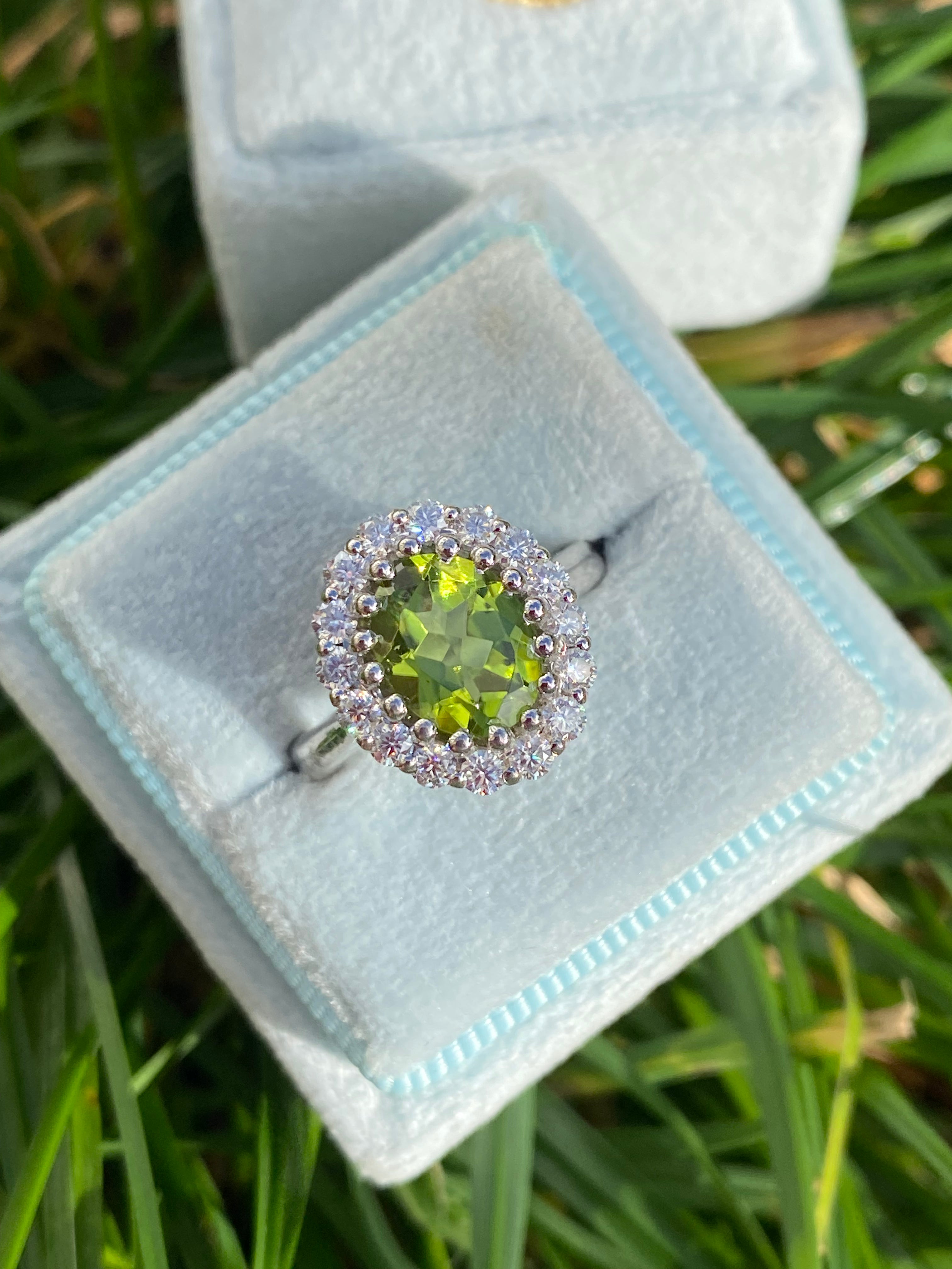 2.33 CTW Oval Cut Peridot and Moissanite Halo Cocktail Ring in Sterling Silver
