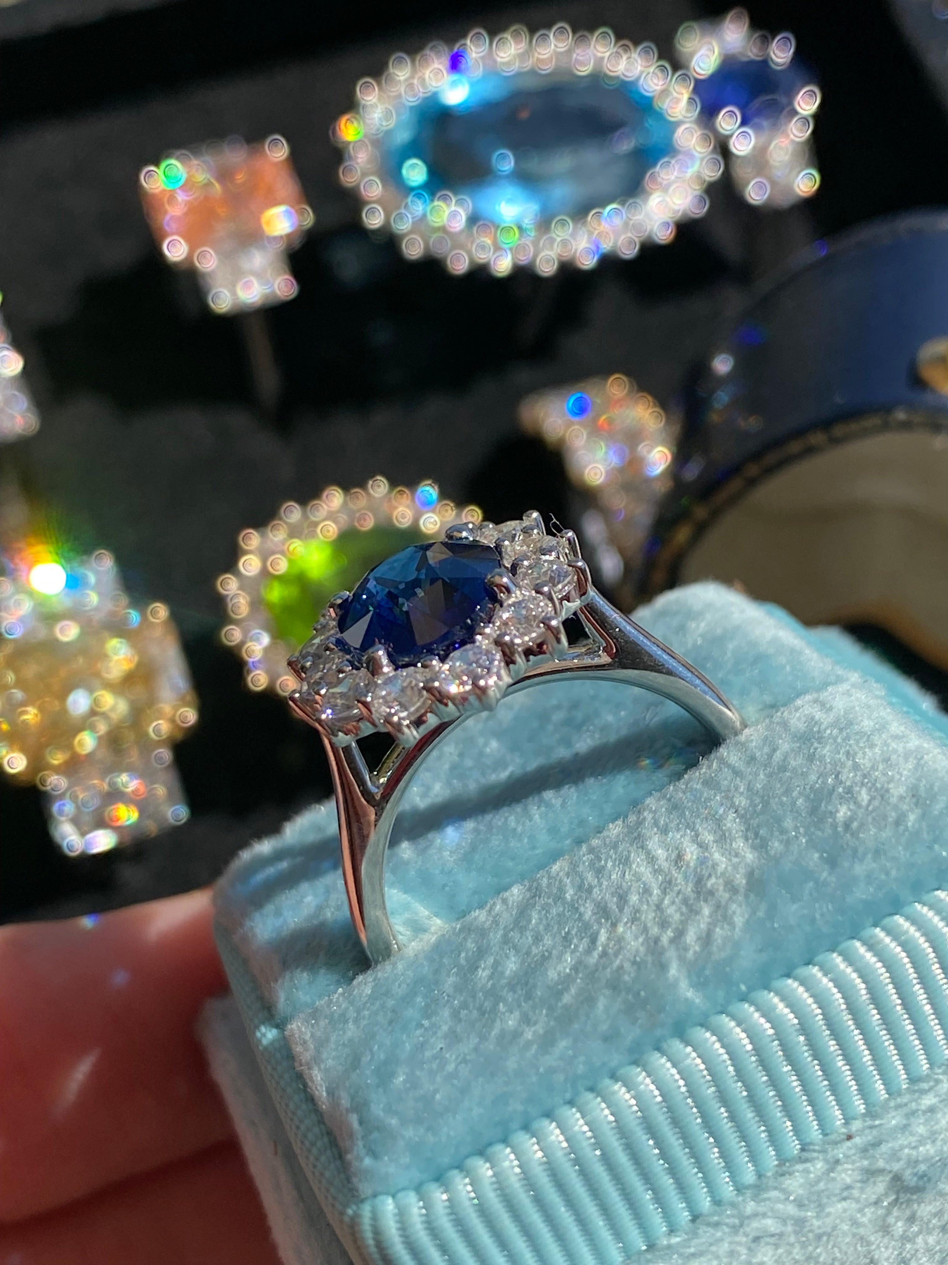 6.37 Carat Gubelin Certed Blue Ceylon Sapphire and 1.80 CTW Natural Diamond Halo Ring in Platinum