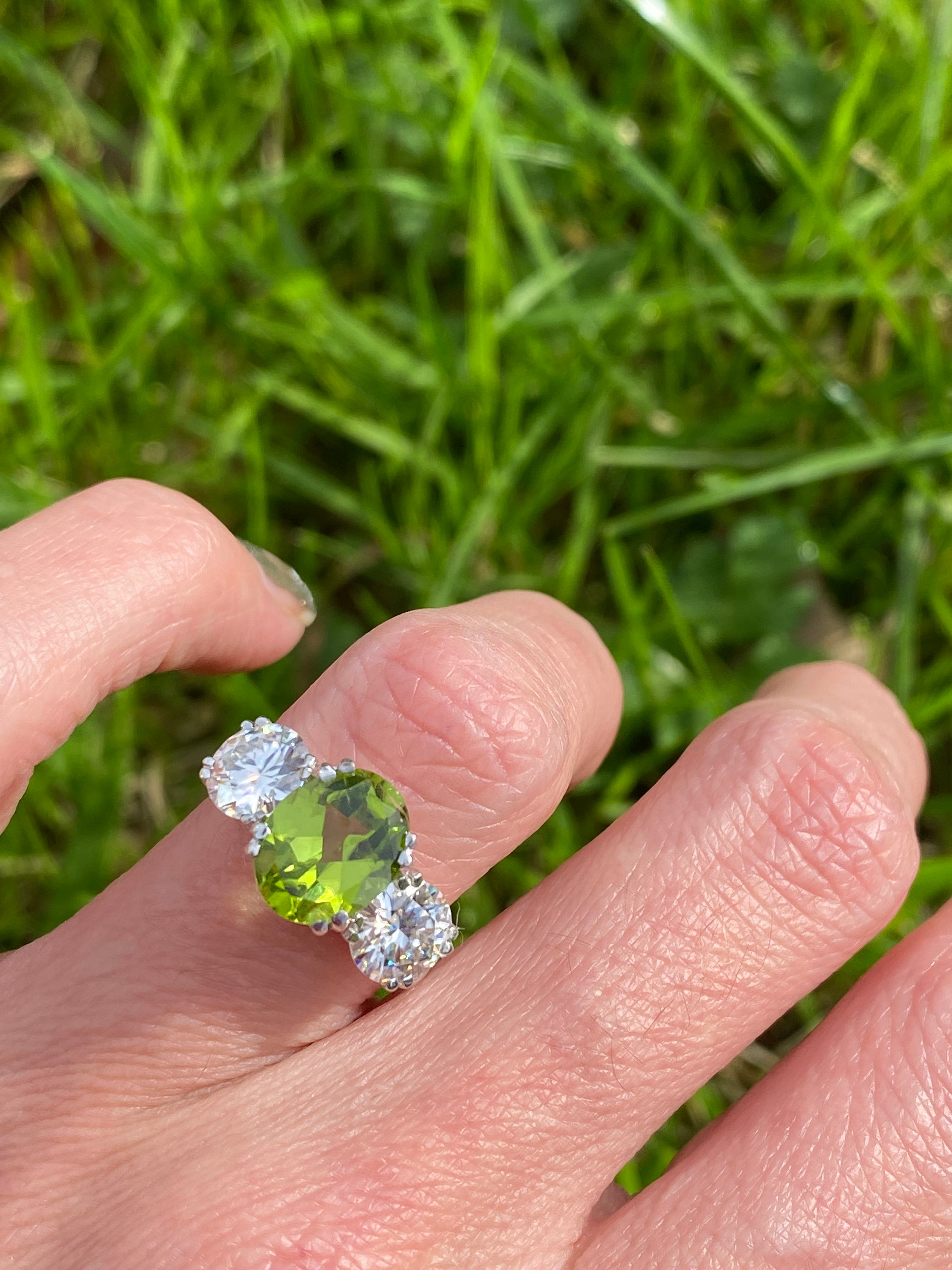 2.57 Carat Peridot and 1.84 Carat Moissanite Three Stone Ring in Sterling Silver