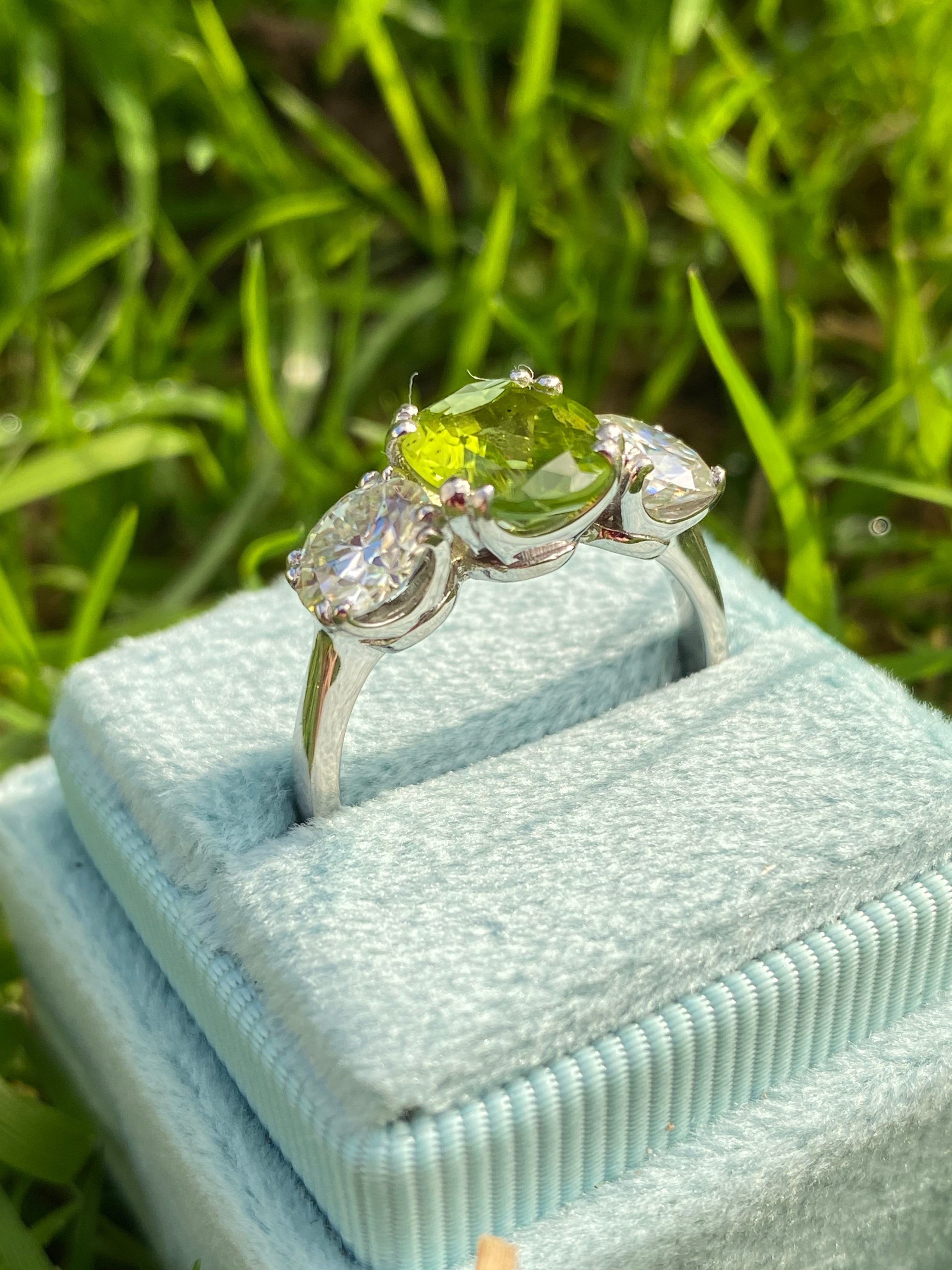 2.57 Carat Peridot and 1.84 Carat Moissanite Three Stone Ring in Sterling Silver