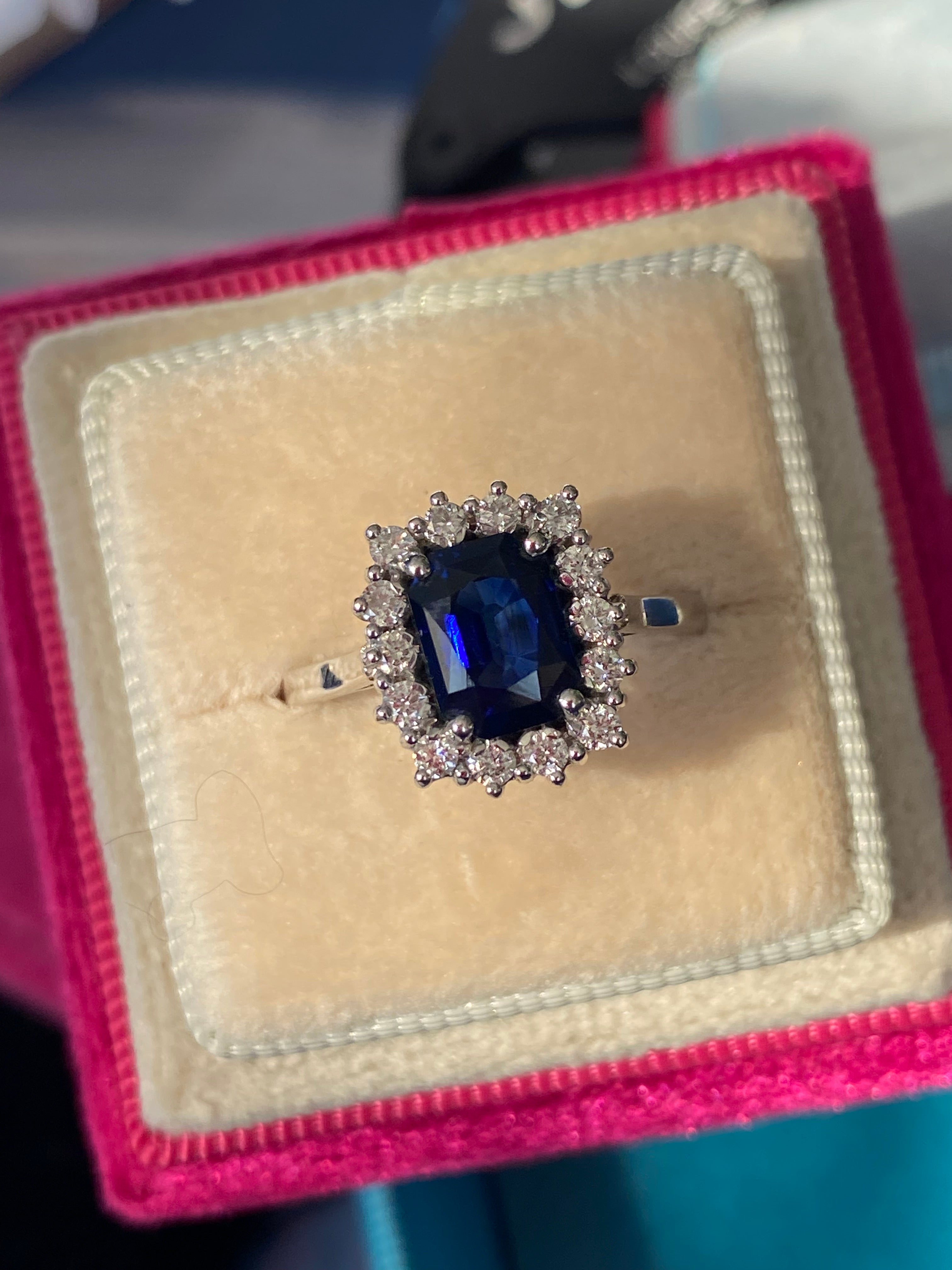 Vintage 2.05 Carat Sapphire and Natural Diamond Halo Ring in Platinum