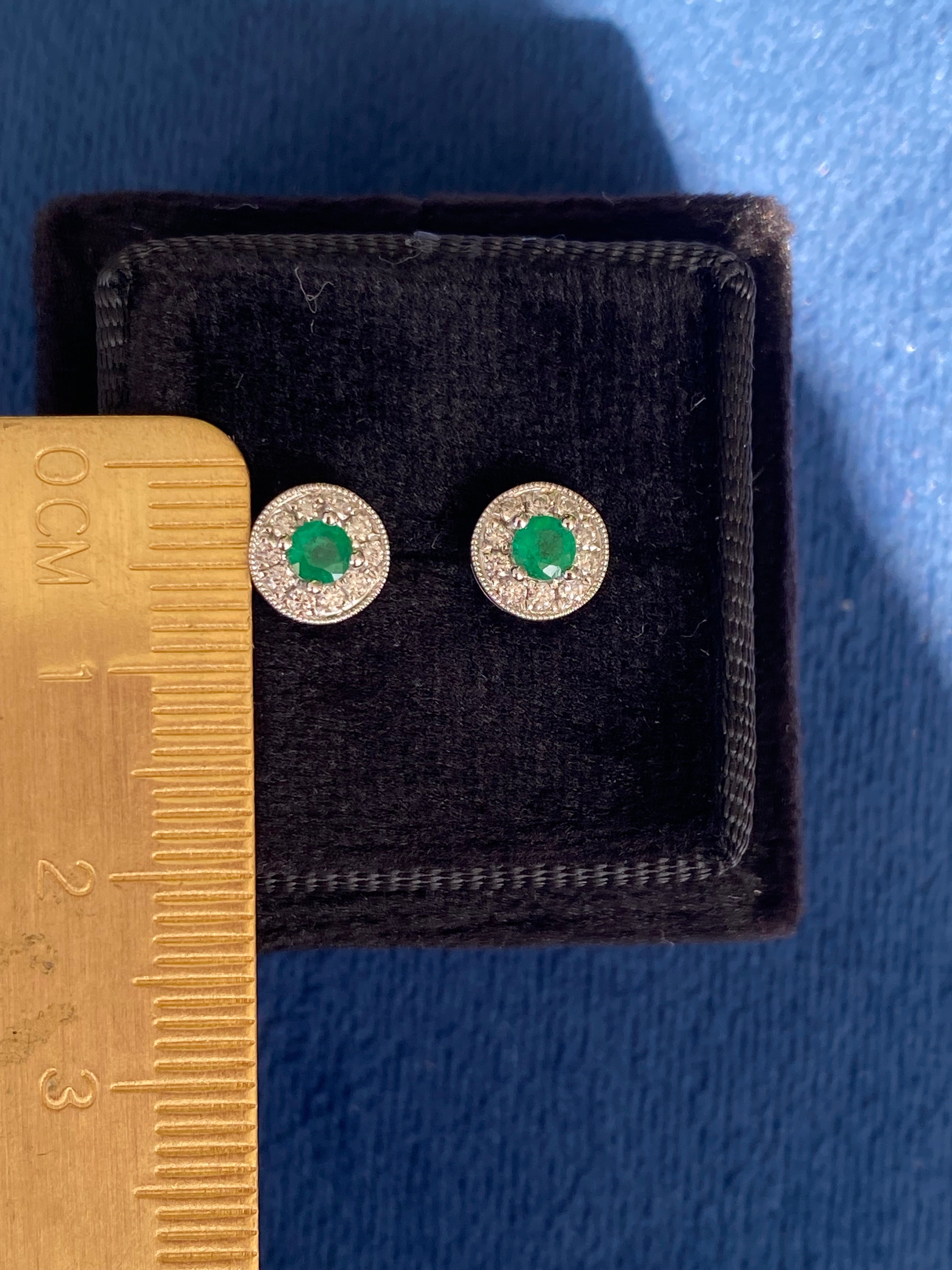 Emerald and Natural Diamond Halo Stud Earrings in 18ct White Gold