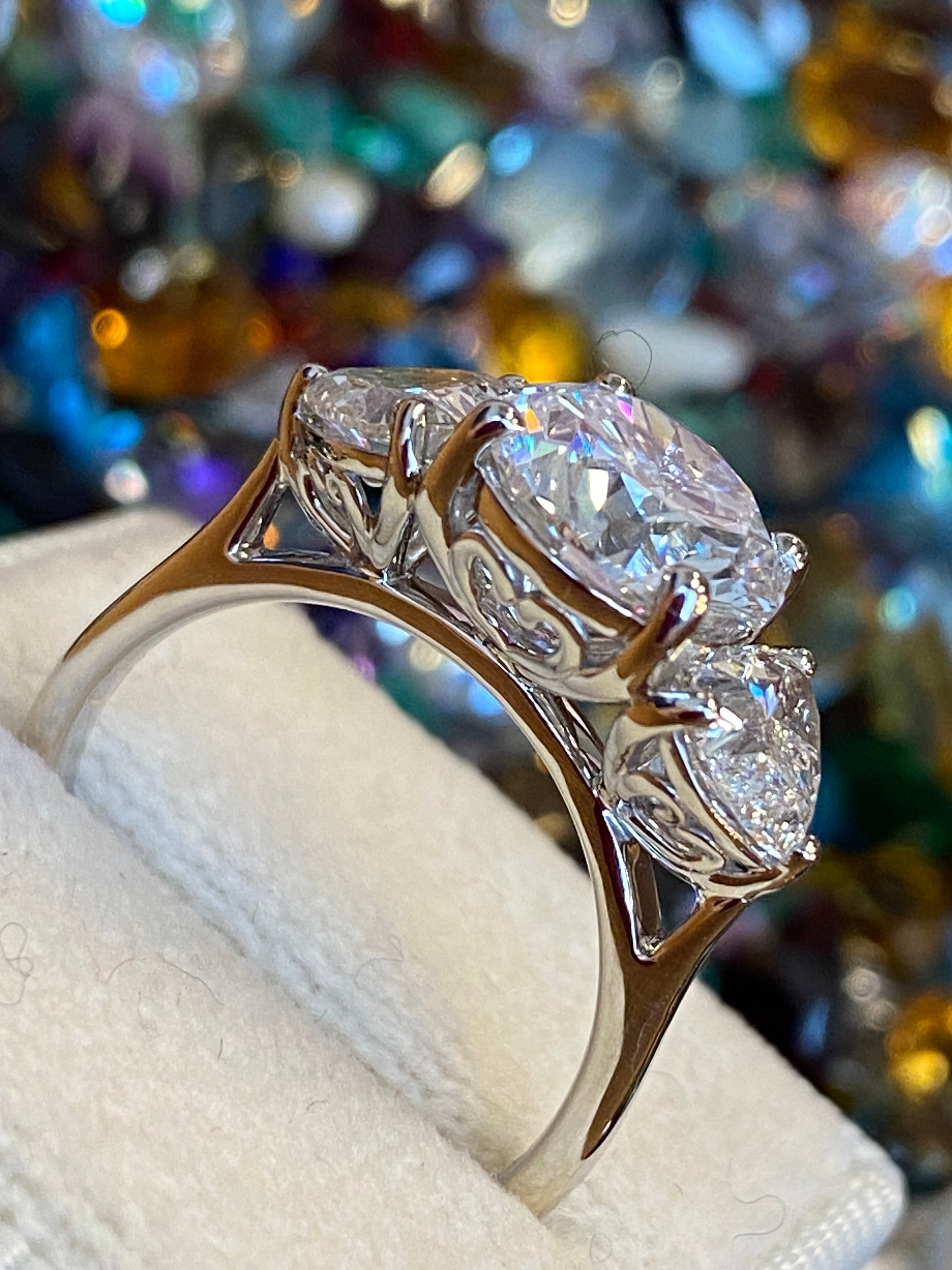 3.80CT + Brilliant Cut Oval and Heart Lab Grown Diamond Three Stone Engagement Ring, D Colour / VS Clarity in Platinum