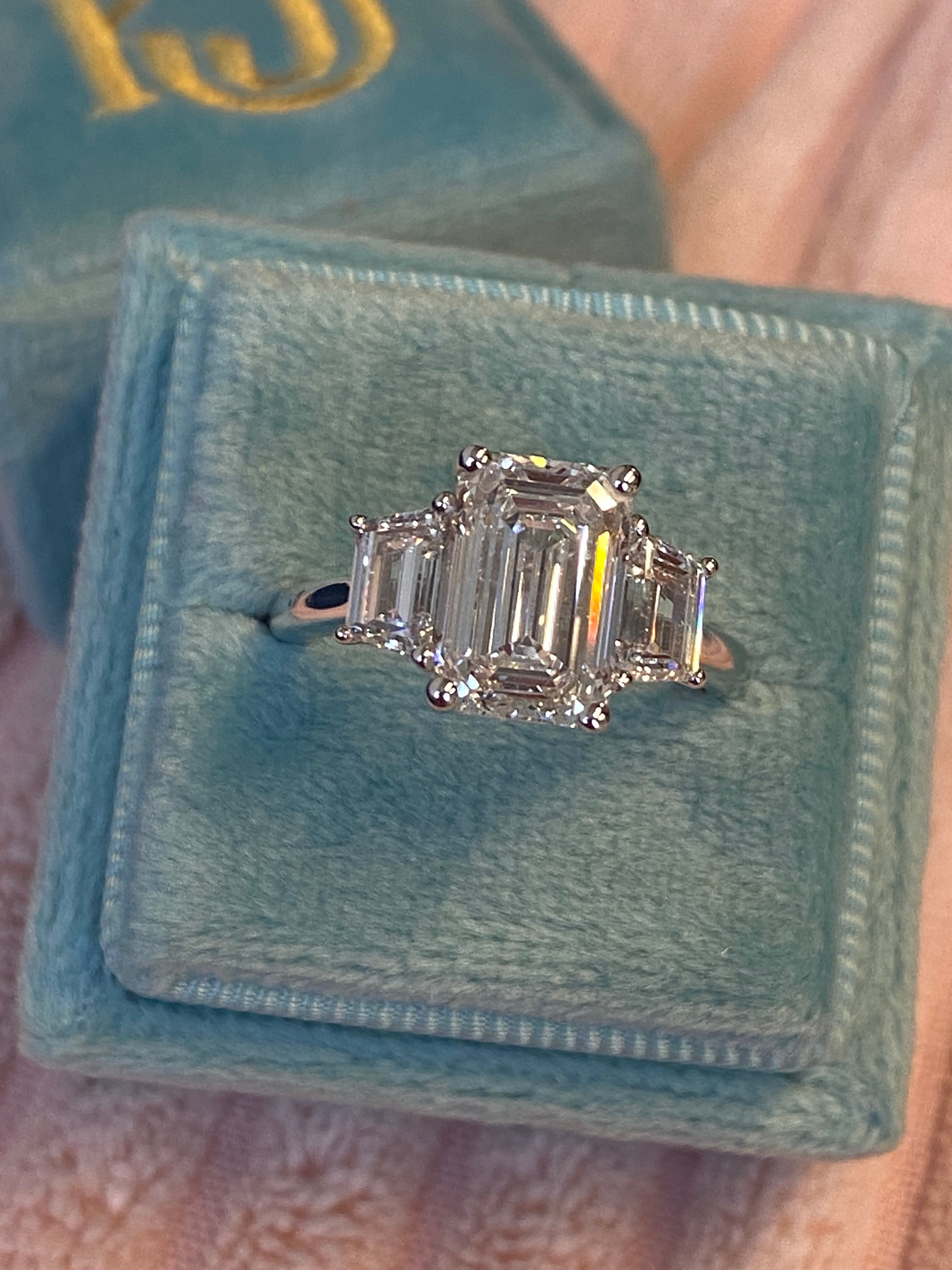 3.93 CTW Emerald and Trapezoid Cut D Colour VS1 Lab Diamond Three Stone Ring in Platinum