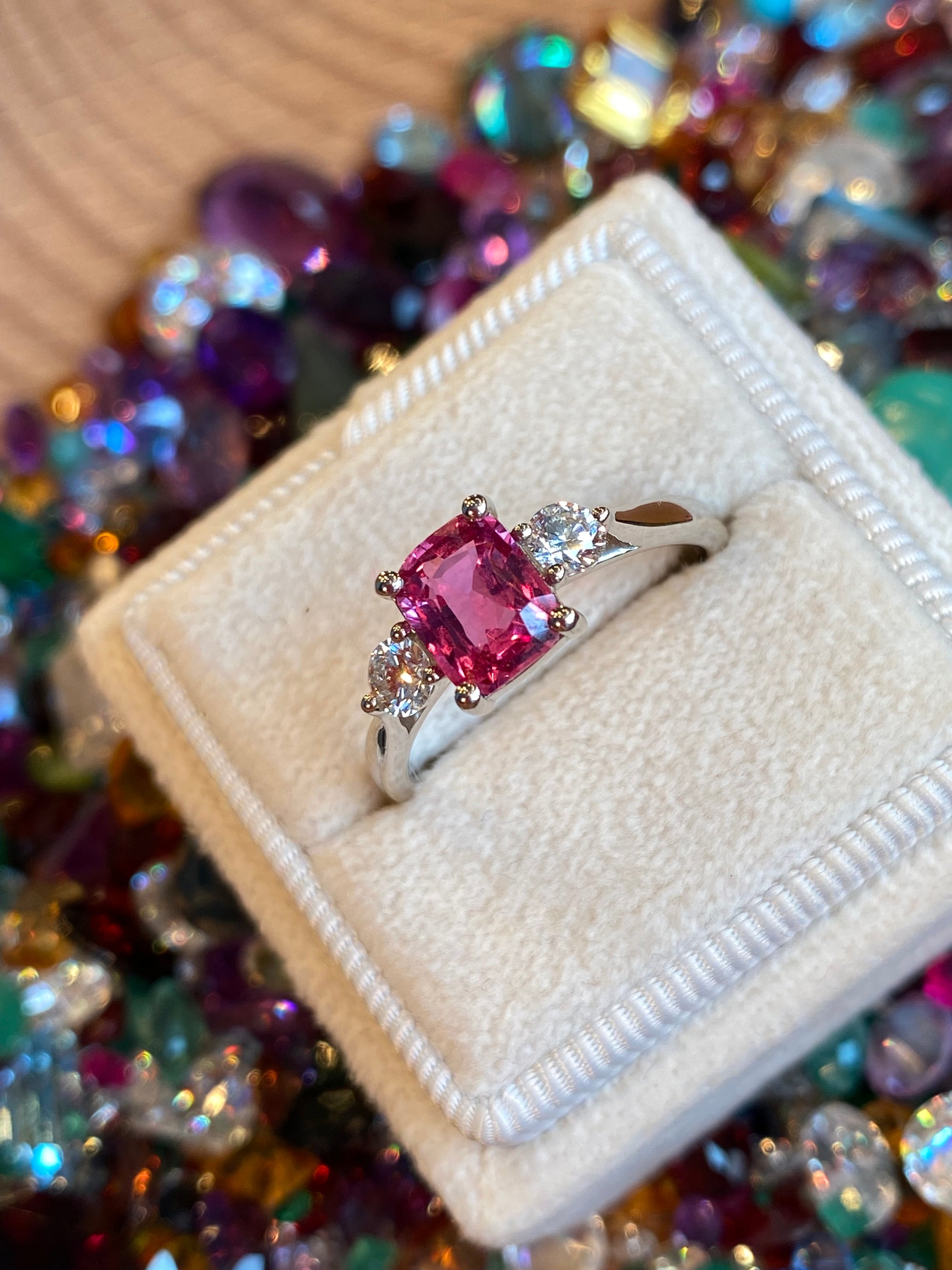 1.52 CTW Cushion Cut Ruby and Natural Diamond Three-Stone Engagement Ring in Platinum