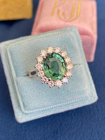 3.06 Carat Blue Tourmaline and Natural Diamond Halo Ring in Platinum and 18ct Yellow Gold