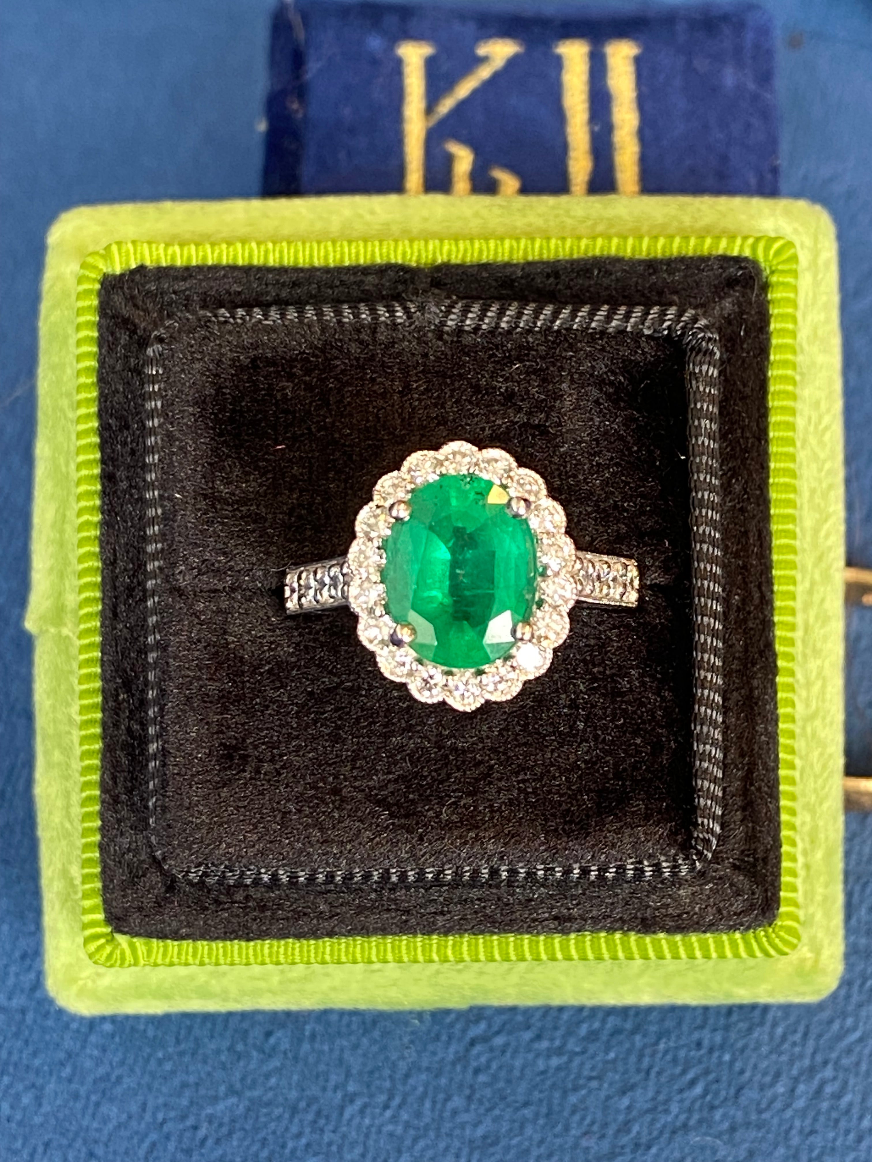 3.12 CTW Oval Cut Emerald and Natural Diamond Halo Ring in Platinum