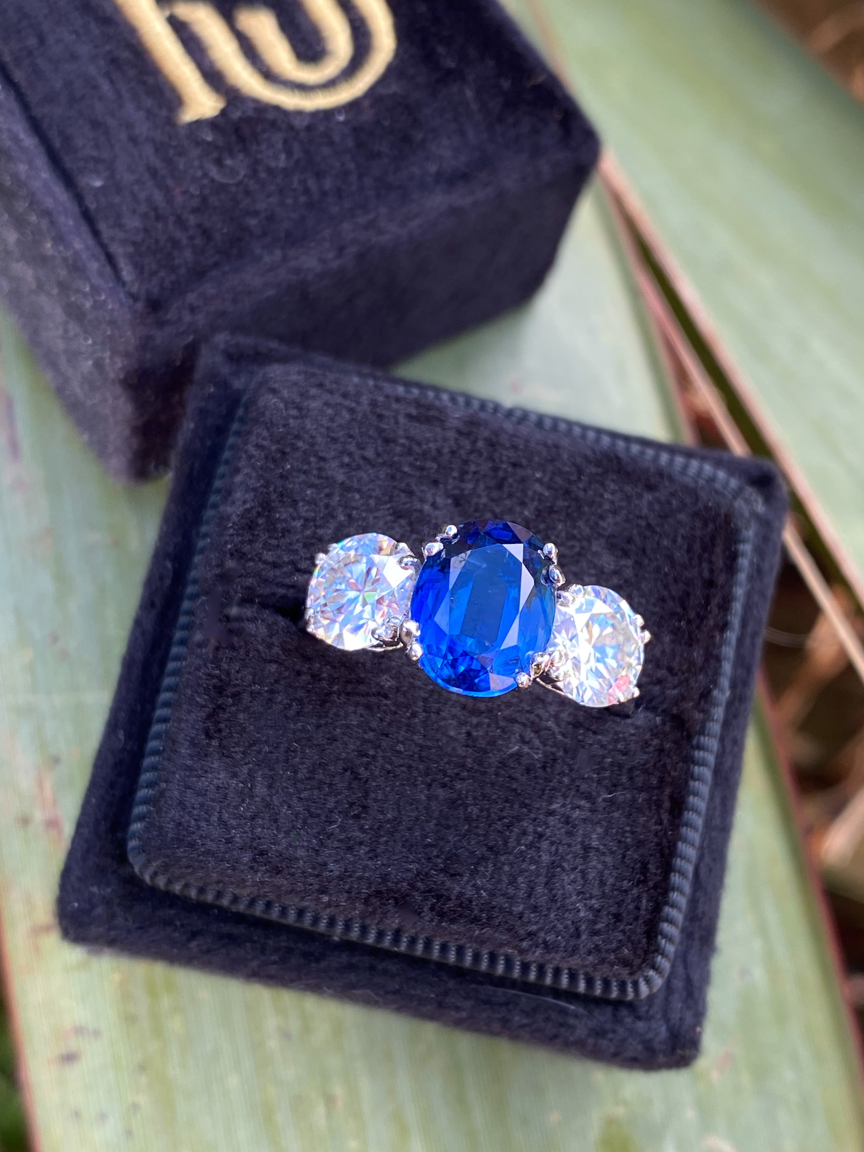 4.41 CTW Oval Cut Kyanite and Moissanite Three Stone Ring in Sterling Silver